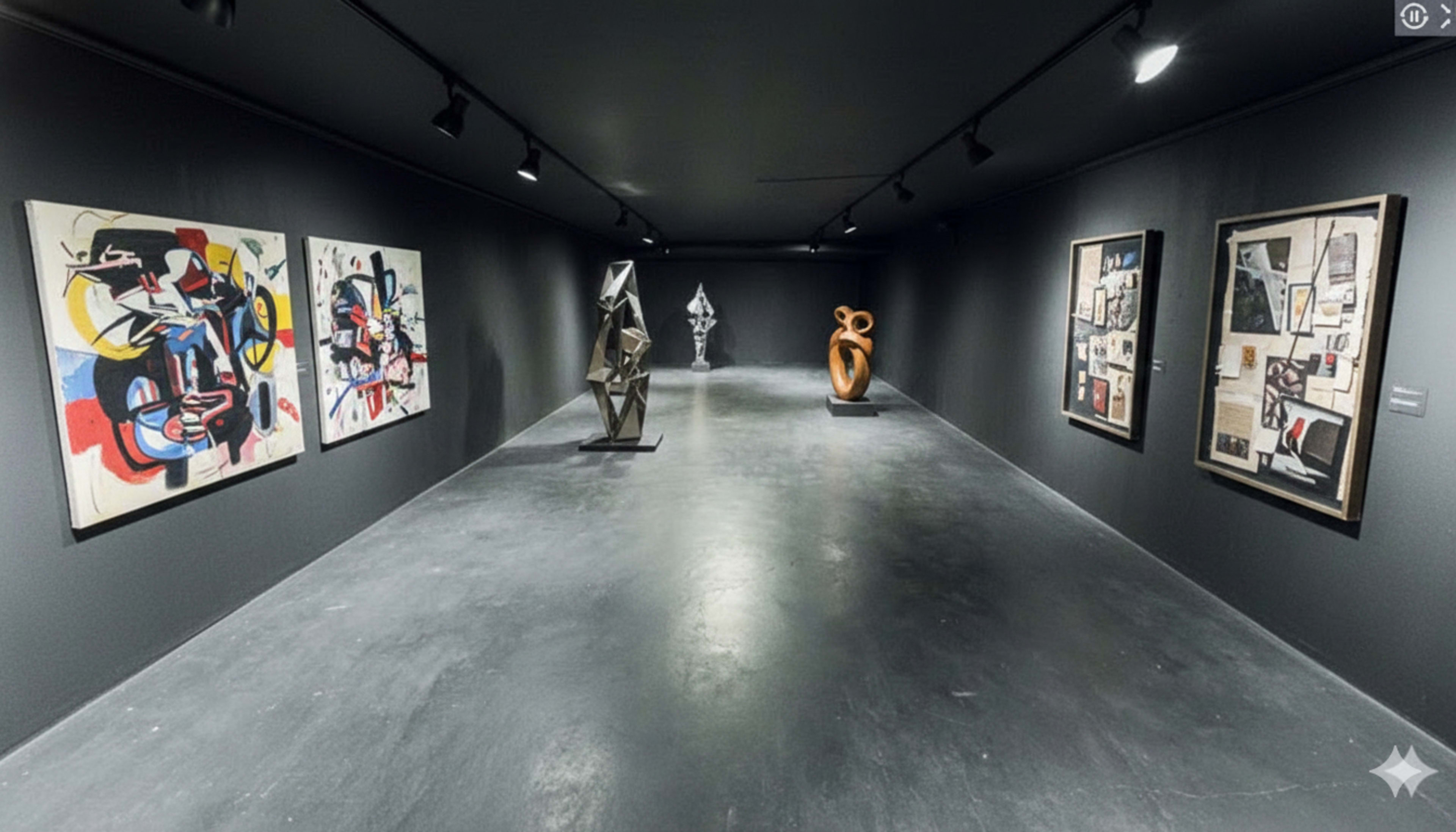 The image shows an art gallery with four abstract sculptures displayed on a polished floor, flanked by two large, colorful paintings on the walls.