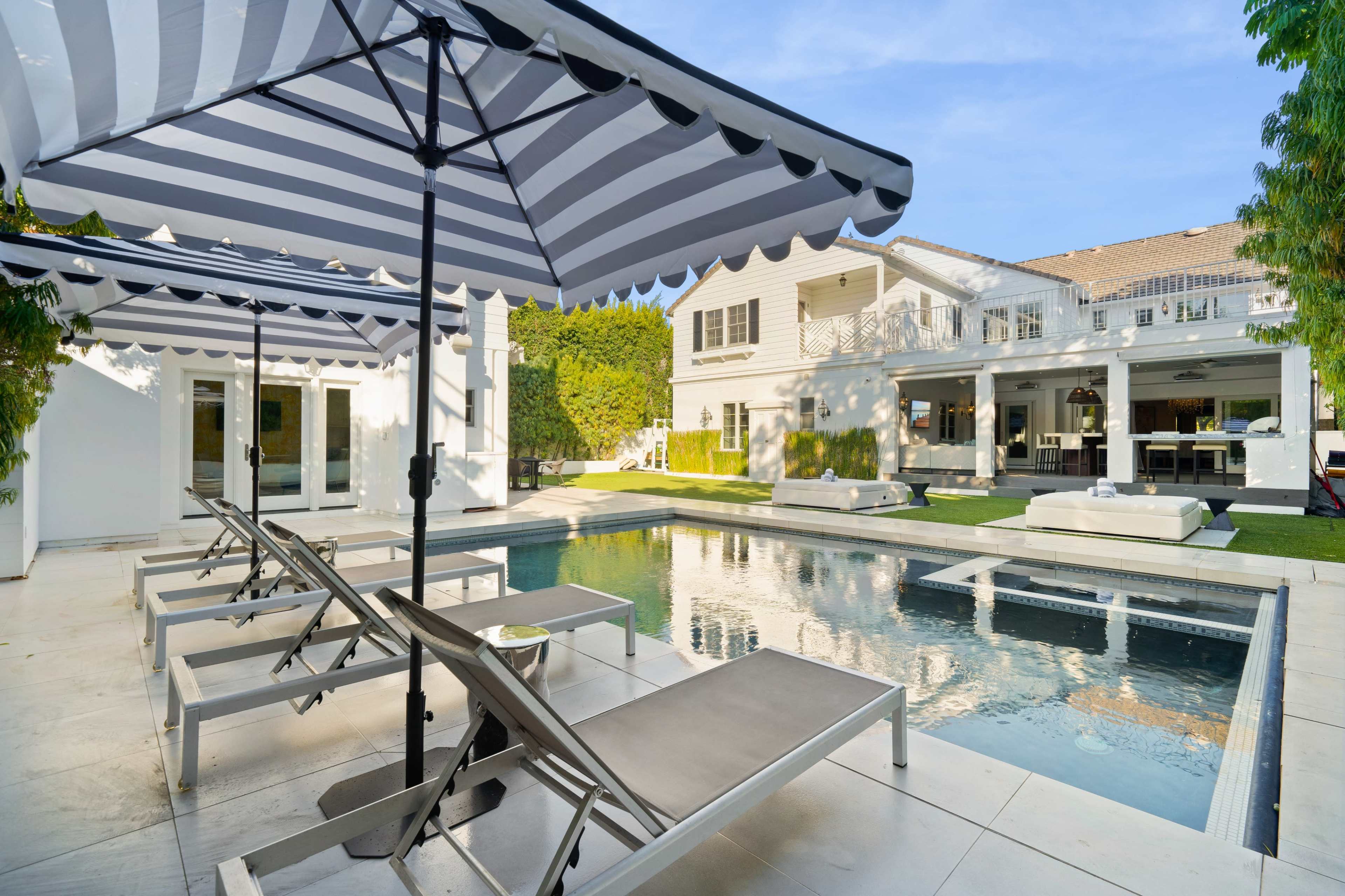 GRAND HAMPTONS-STYLE ESTATE WITH POOL, THEATER & CLASSIC INTERIORS Image in The Flats, Beverly Hills, CA