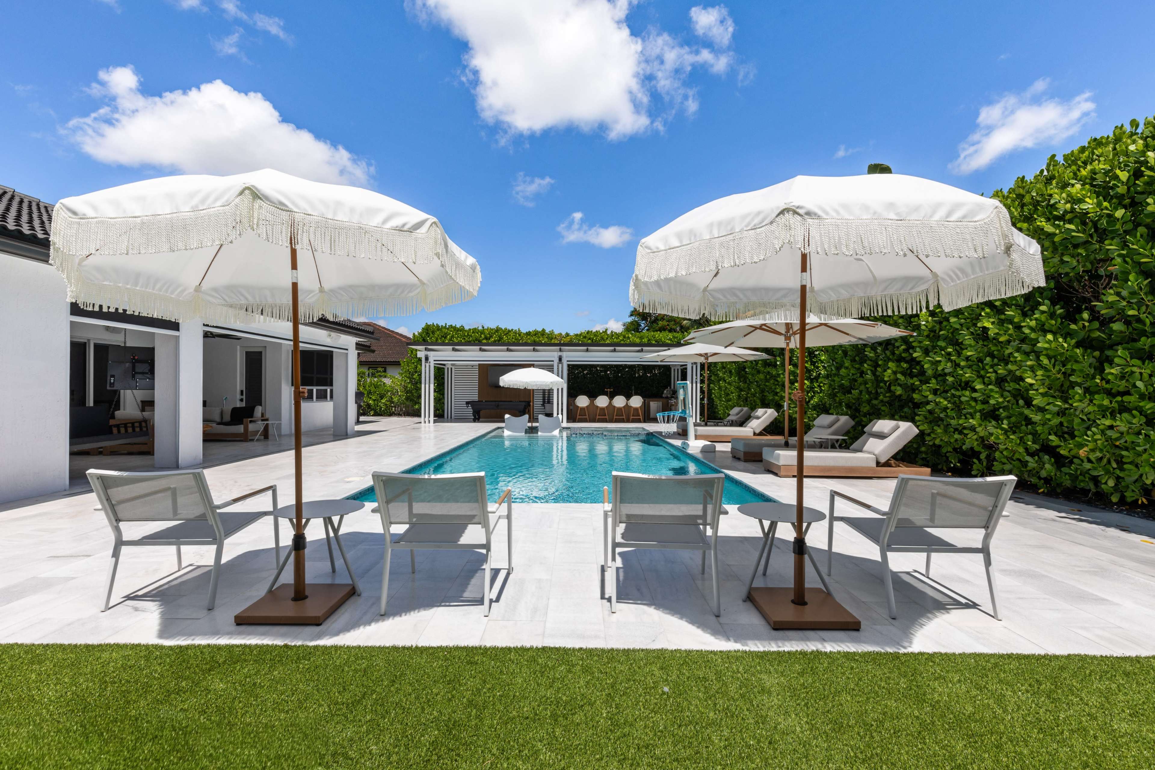 Multi Set Luxe Modern Home with Resort-Style Backyard + Designer Interior Image in , Miami, FL