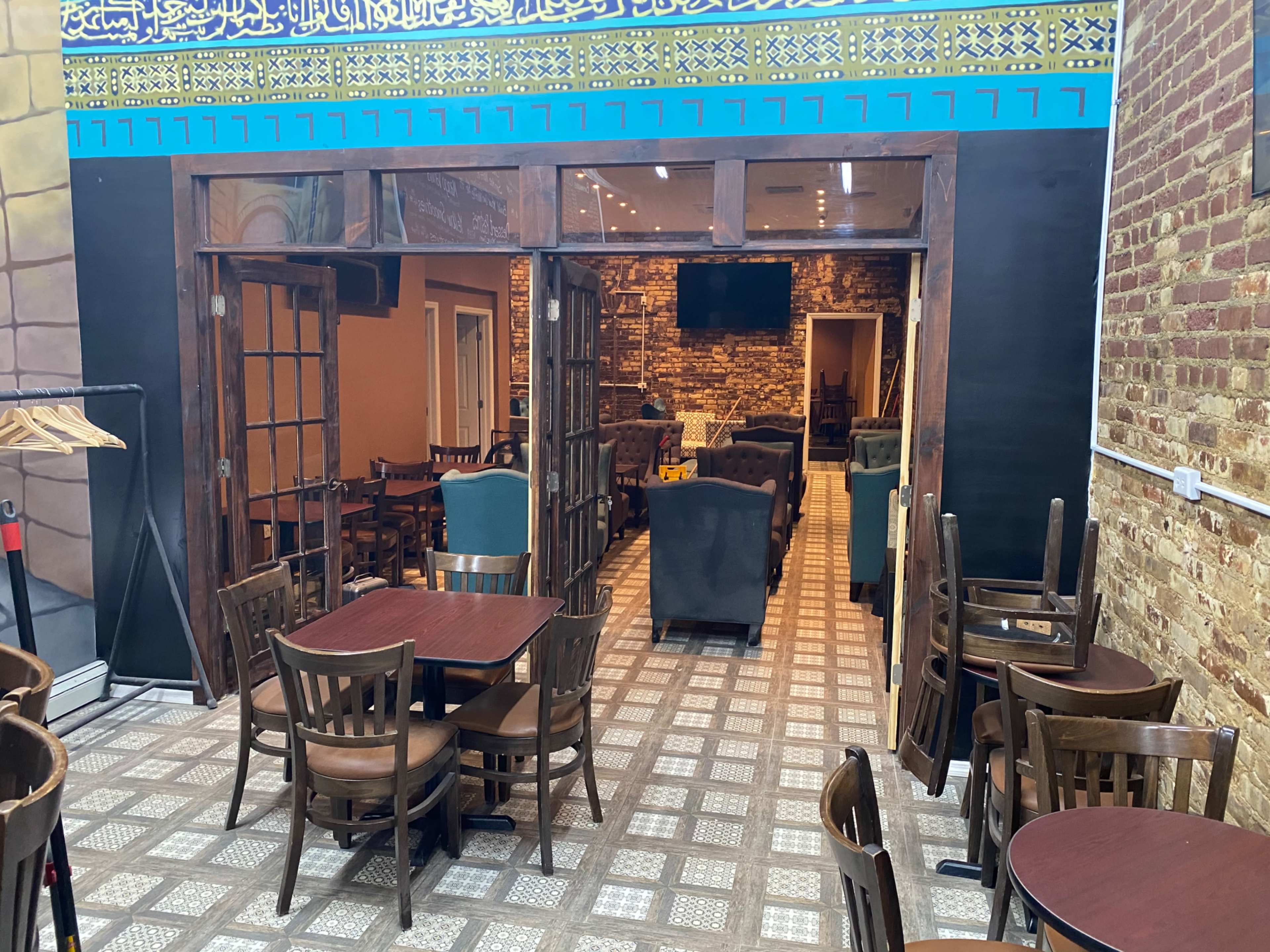 Cafe Lounge with lots of TVs and couches Image in West Bronx, Bronx, NY