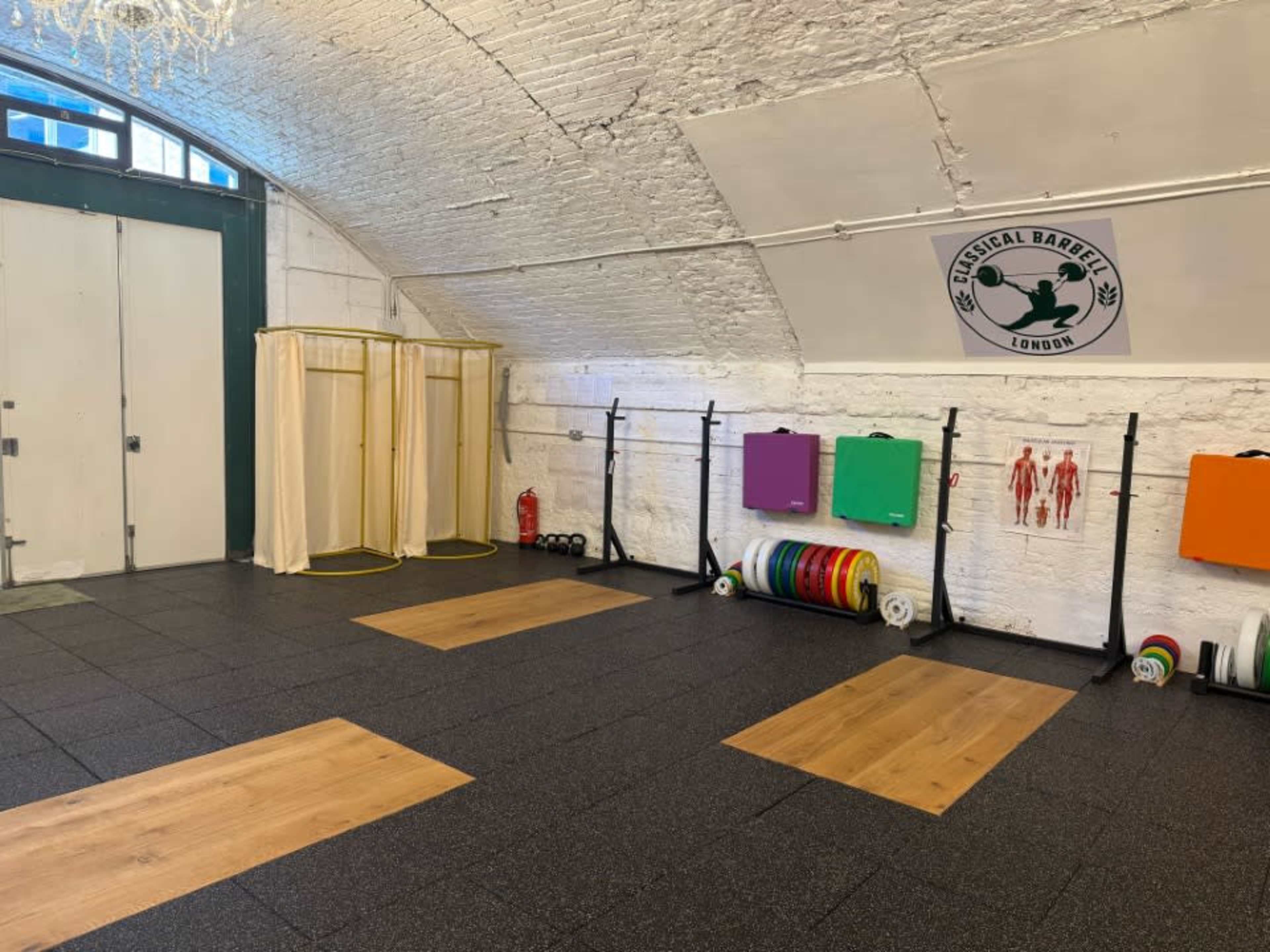 East London Olympic Weightlifting Gym with Chandeliers Image in London, London, ENG