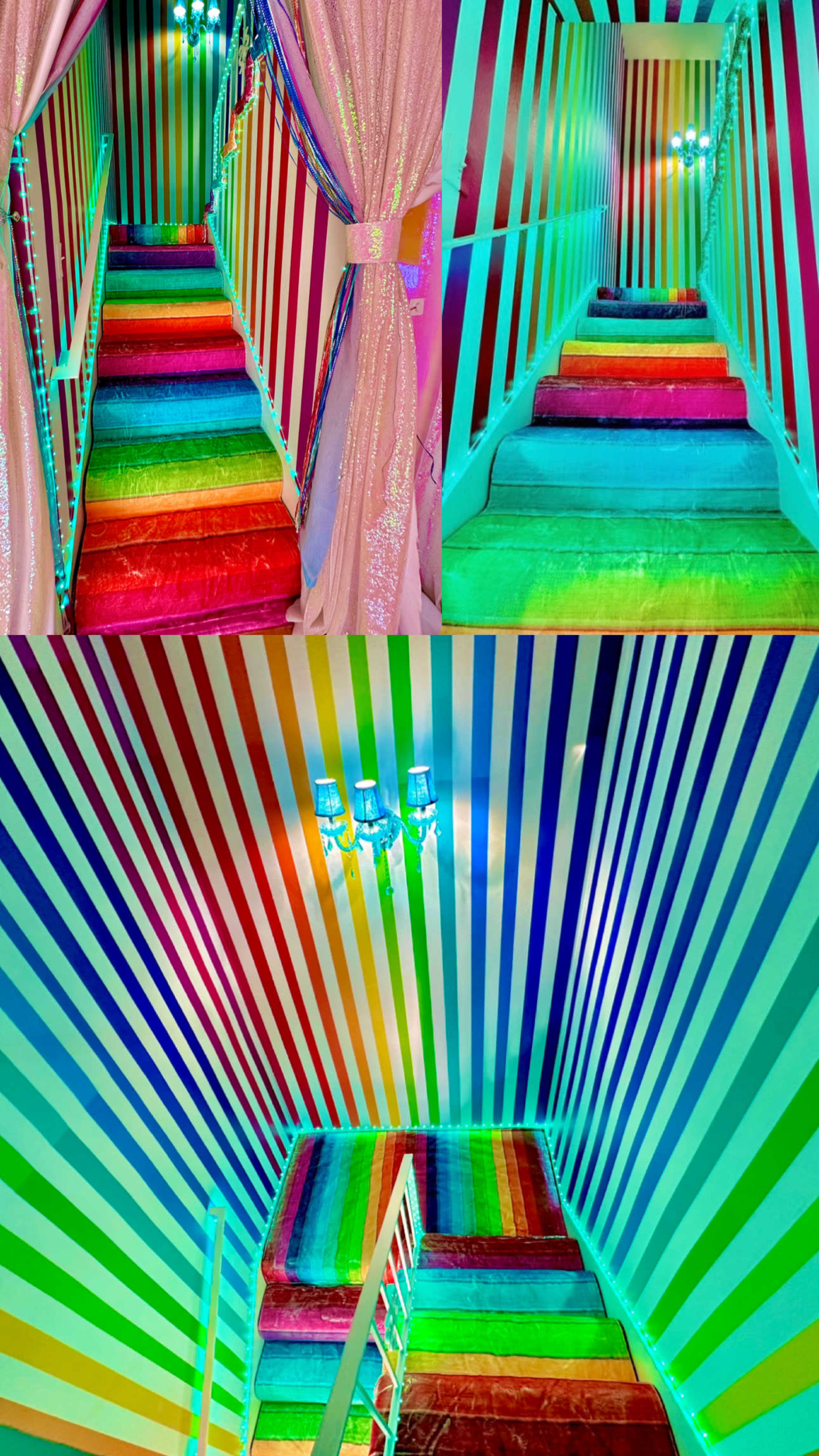 A staircase with brightly colored striped wallpaper and matching carpet in vibrant rainbow colors.