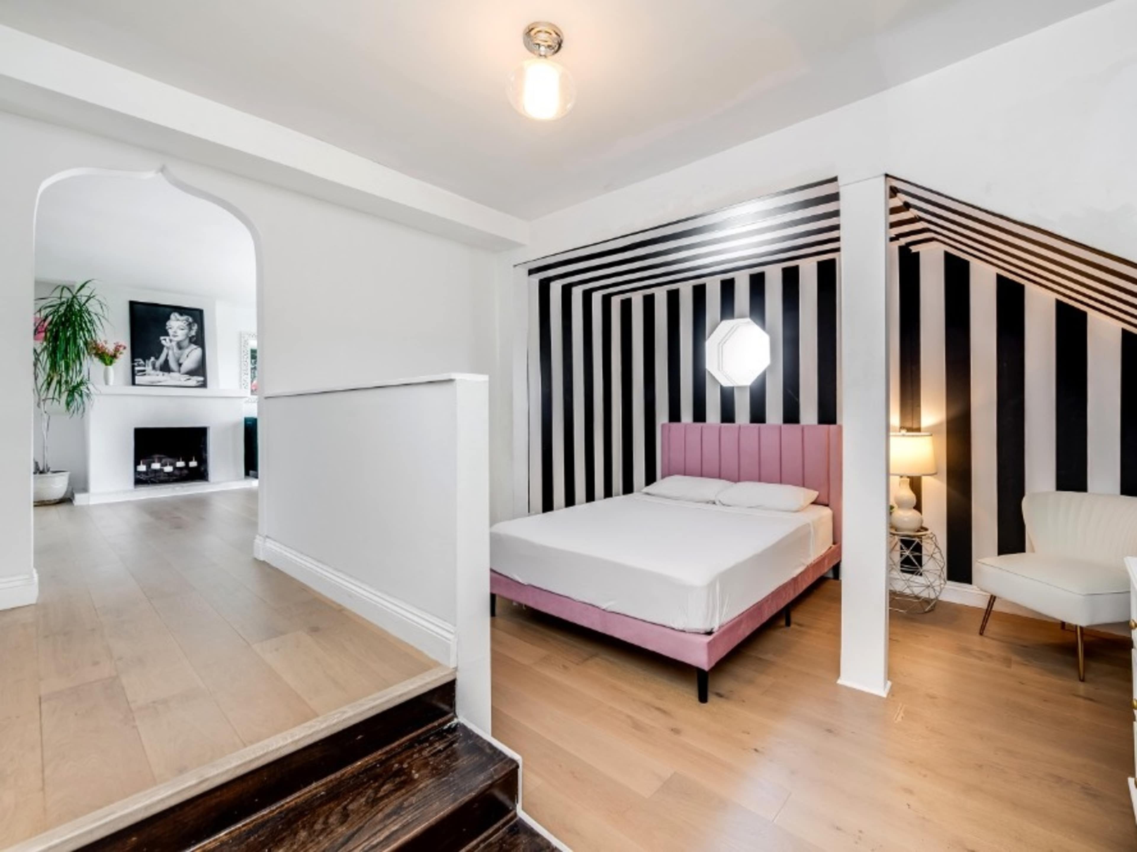 Apartment with striped bedroom