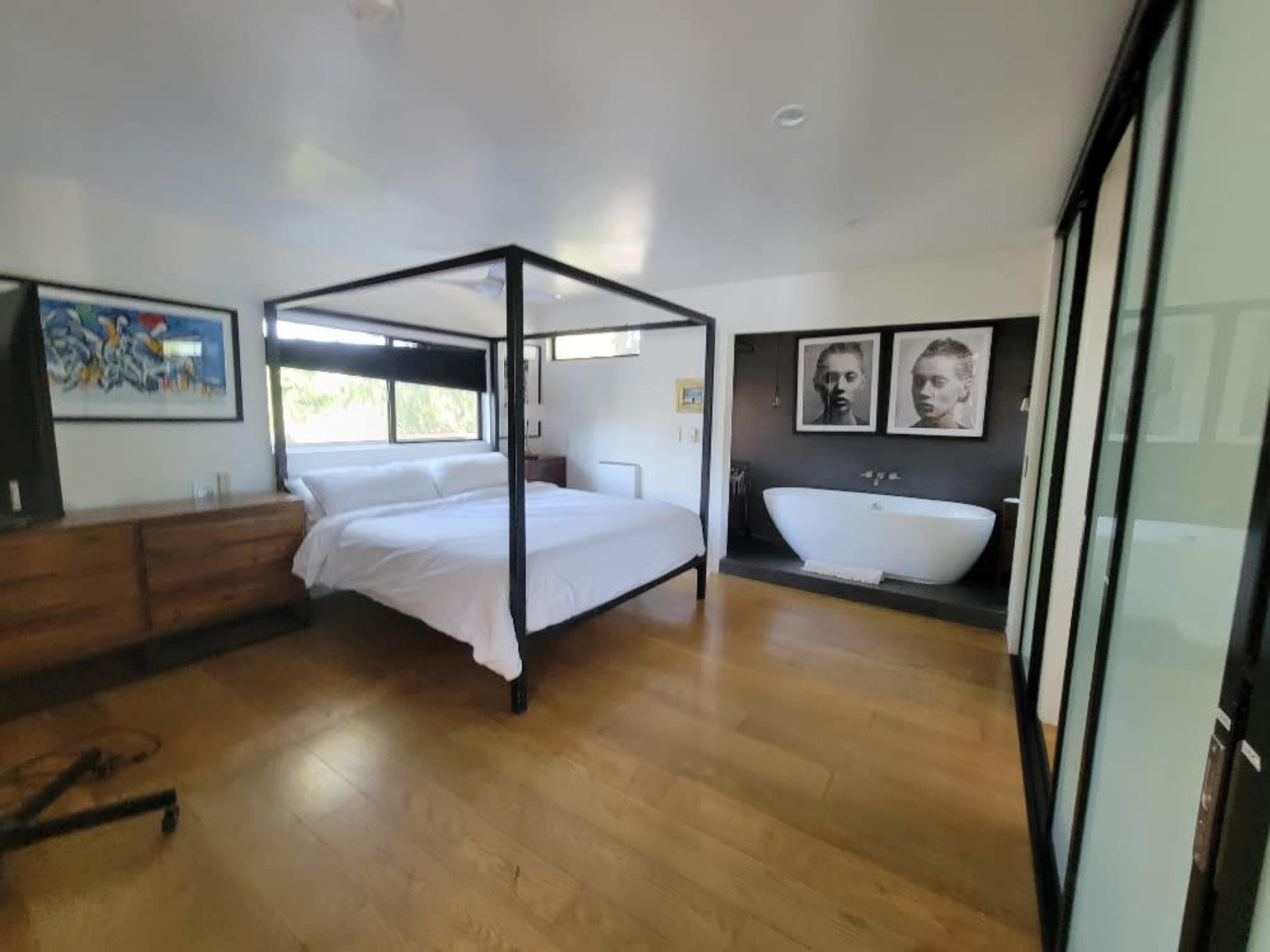 master bedroom with free standing bath tub