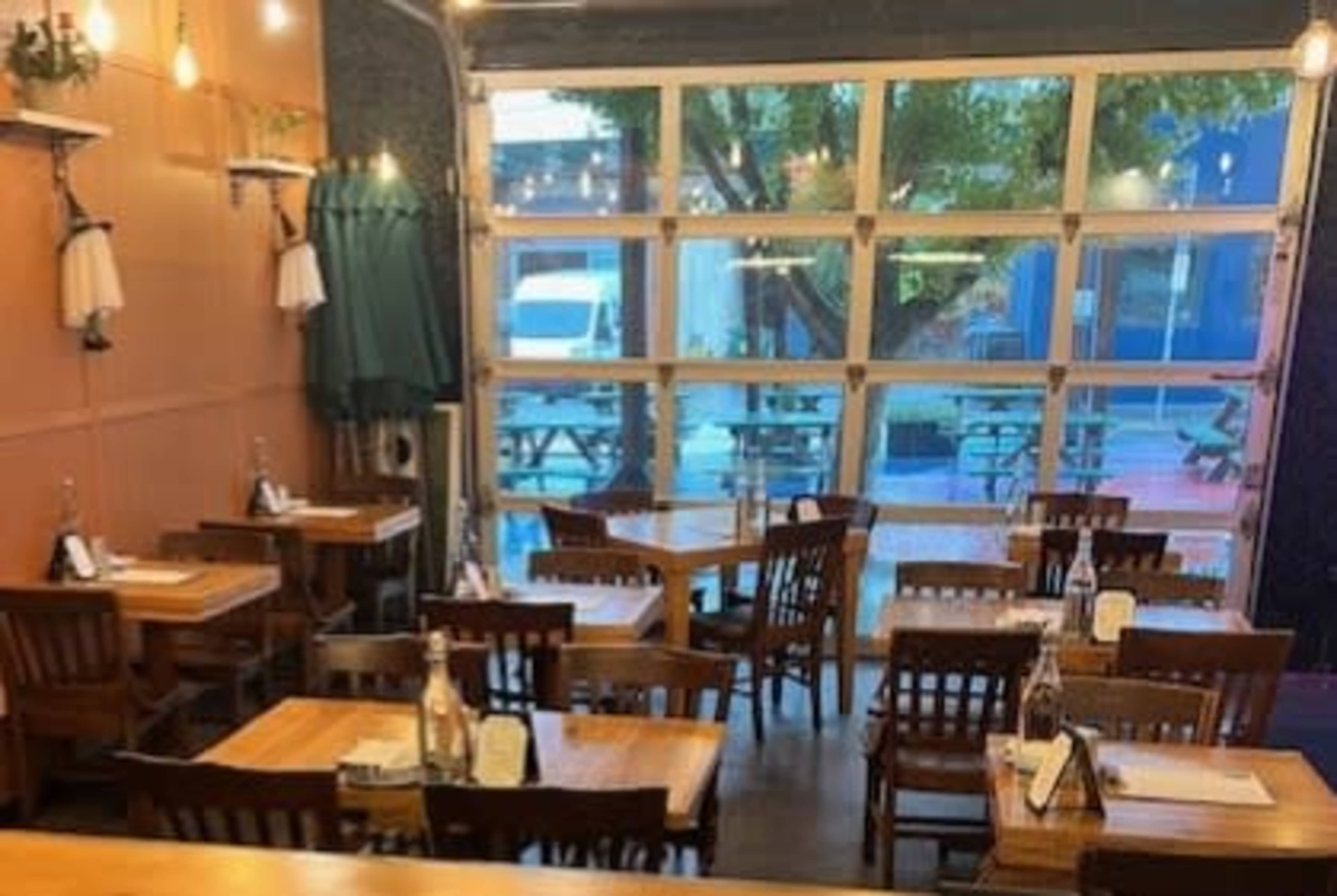 Close-in SE Portland Loft with garage door & kitchen Image in Southeast Portland, Portland, OR