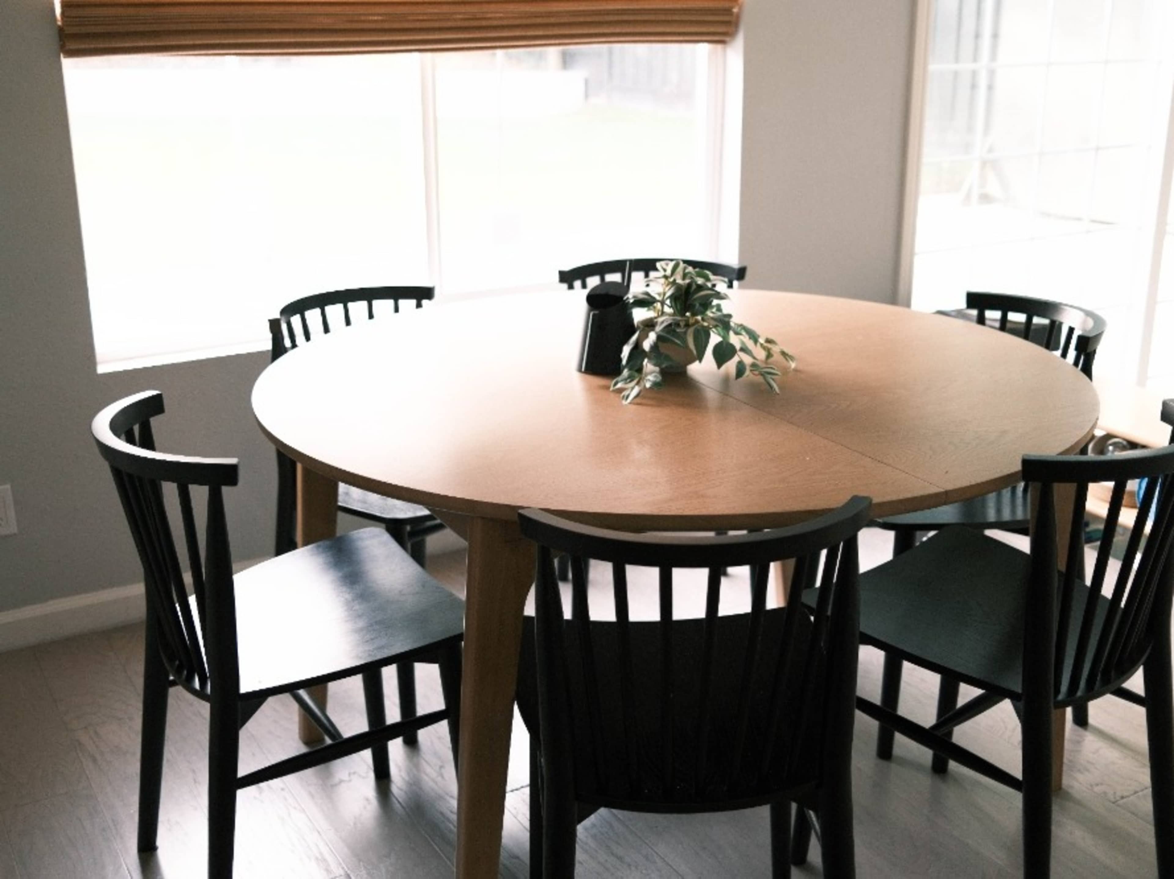 Extendable Dining Table with Black Chairs