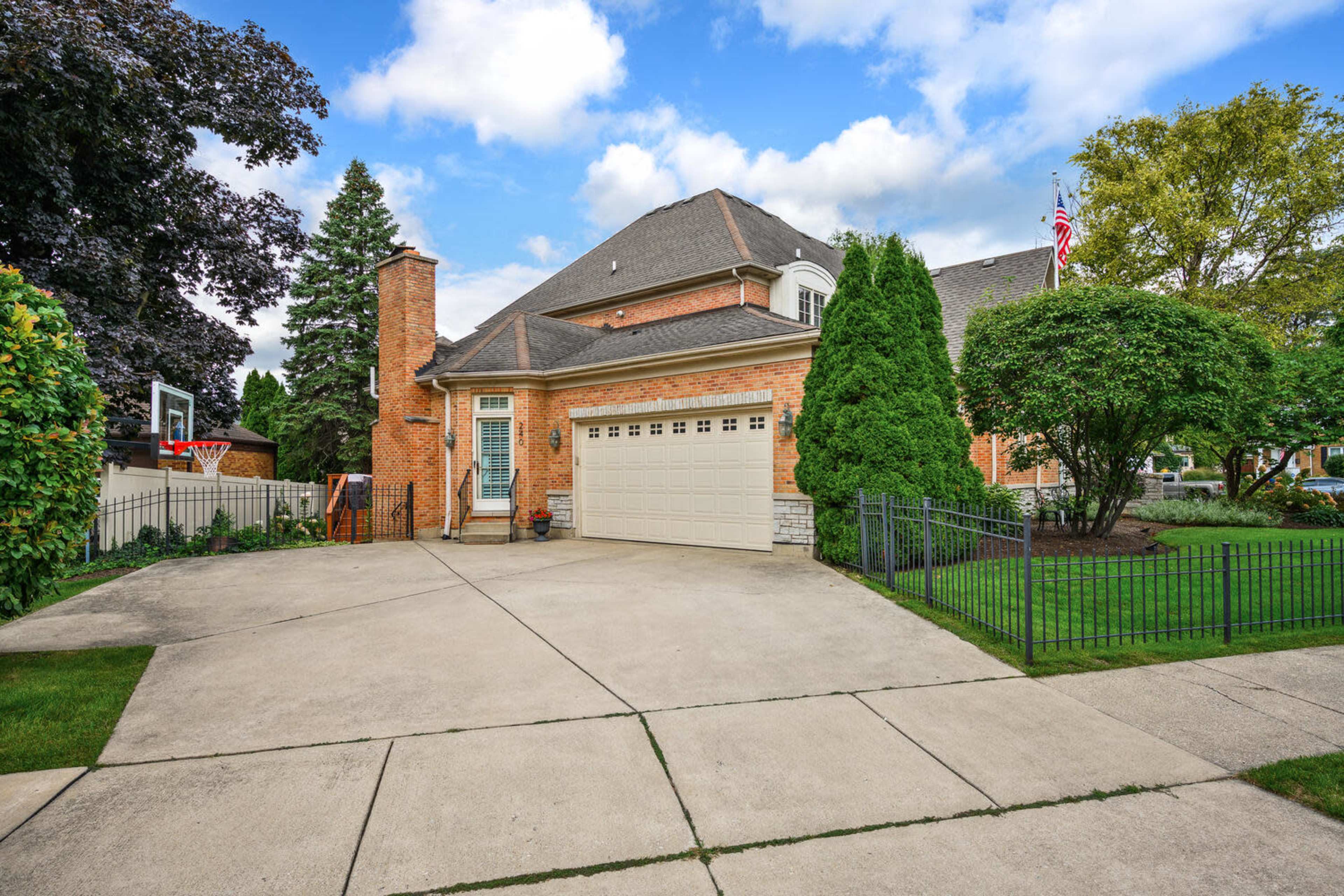 Suburban Refined Brick Estate Blending Classic Charm & Modern Comfort Image in York Township, Elmhurst, IL