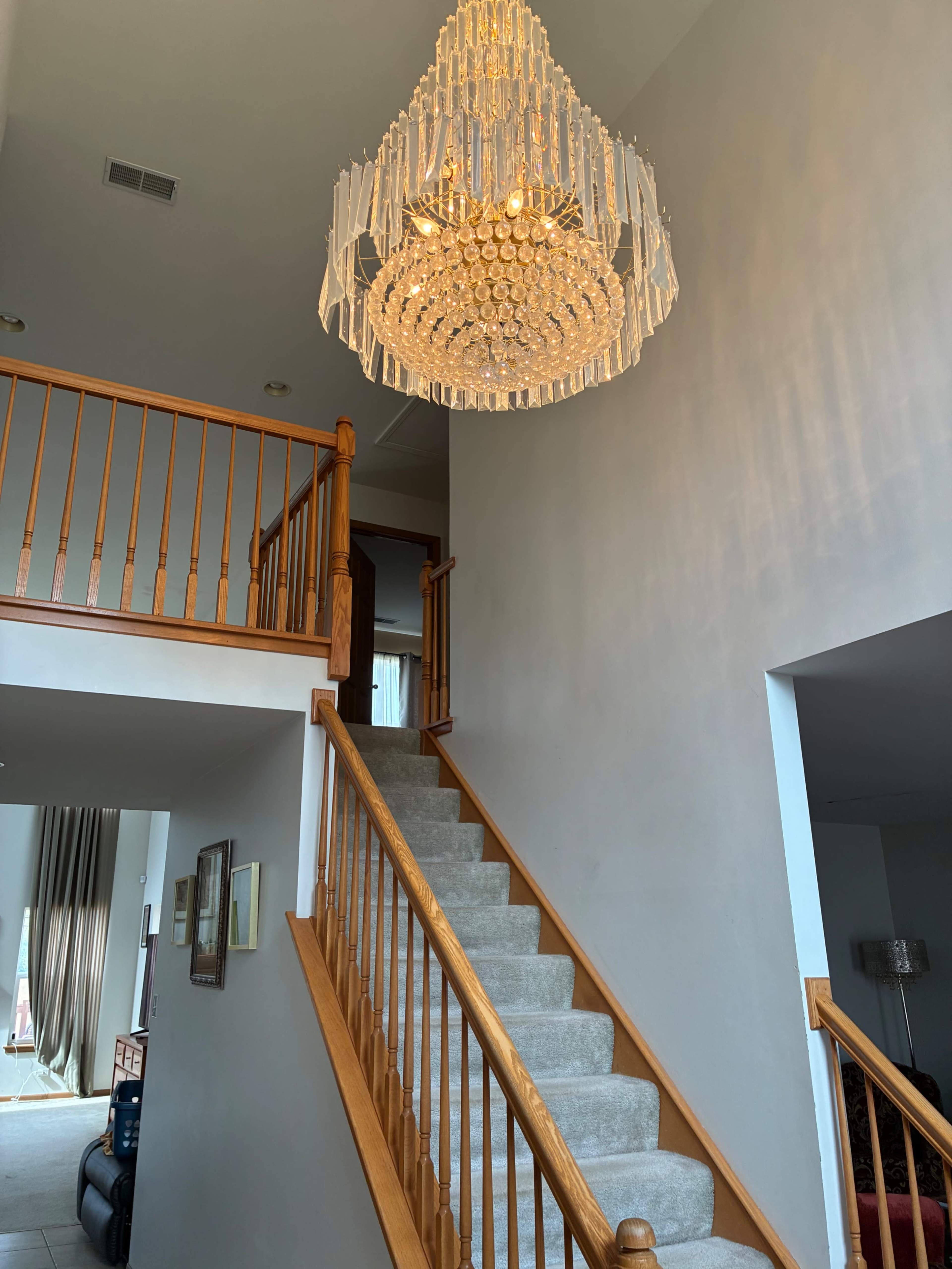 suburban open concept great-room and deck with beautiful forest preserve view Image in Thornton Township, South Holland, IL