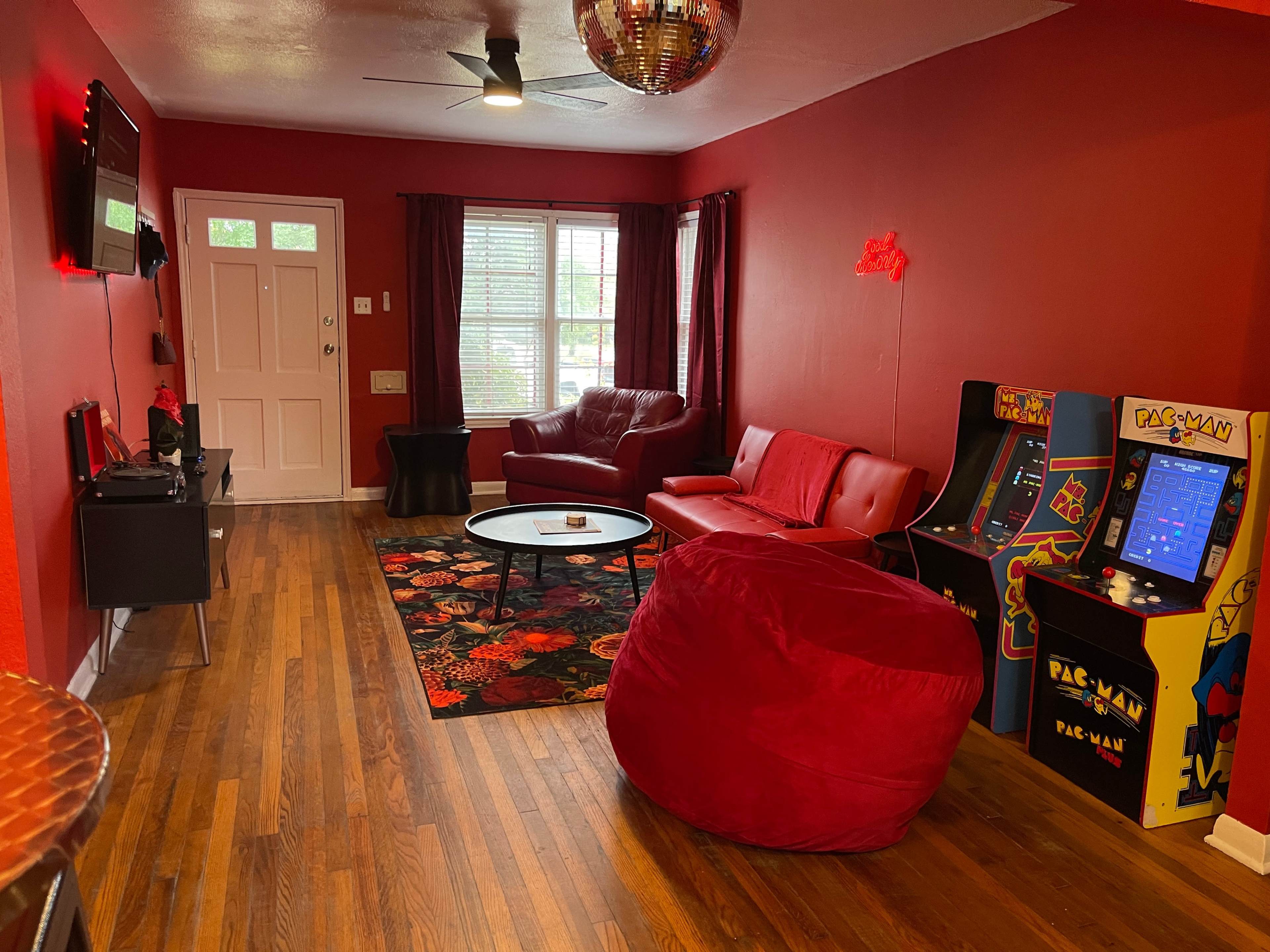 Bold Red Pop-Art Creative Space w/ Arcade Games, Piano & Neon Image in Olmos Park Terrace, San Antonio, TX
