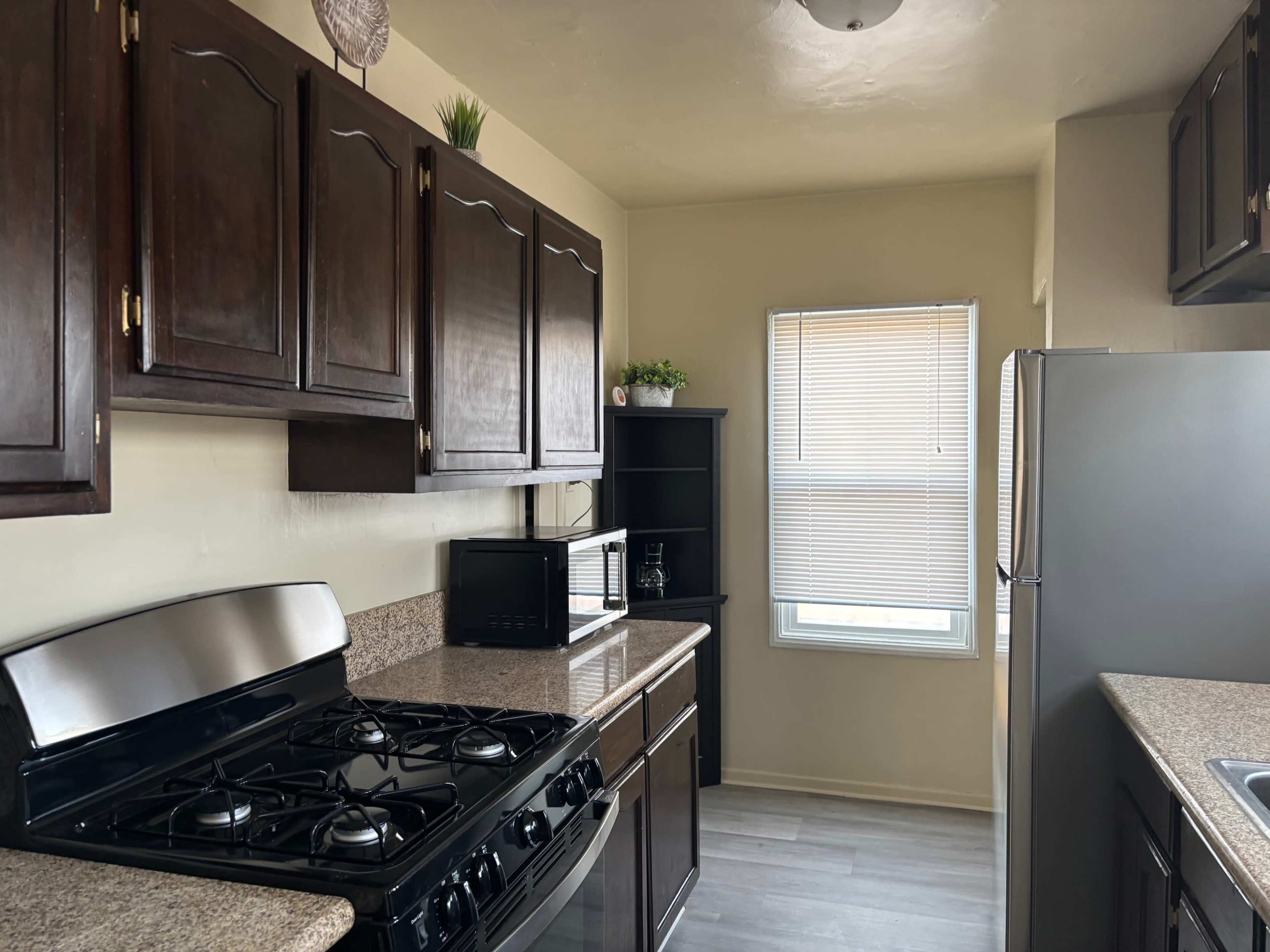 Upstairs- Cozy and Well-Lit Area with Stylish Décor Image in South Los Angeles, Los Angeles, CA