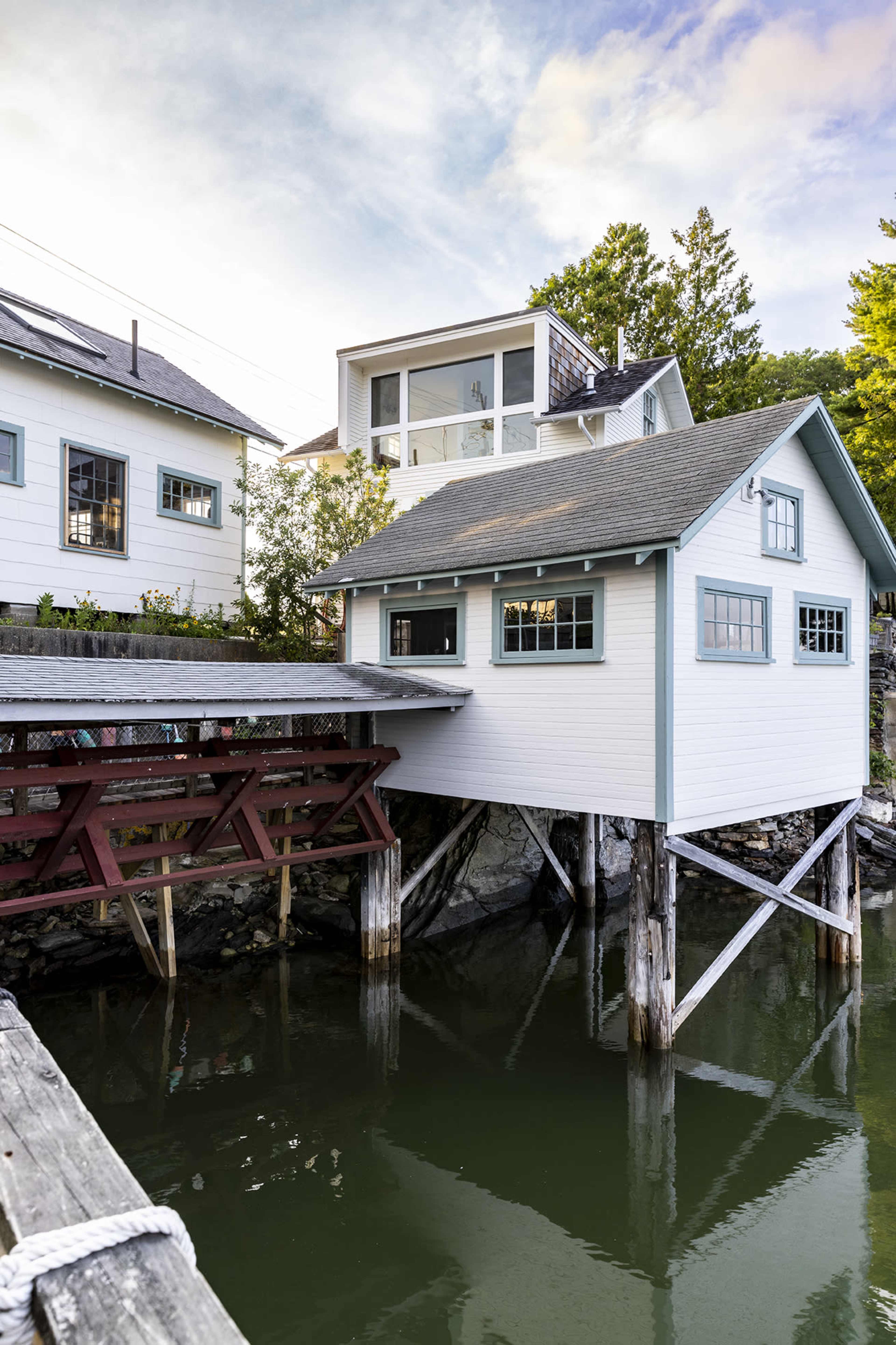 Oceanfront lobstering compound with wharf and buildings over the water Image in Brunswick, Brunswick, ME