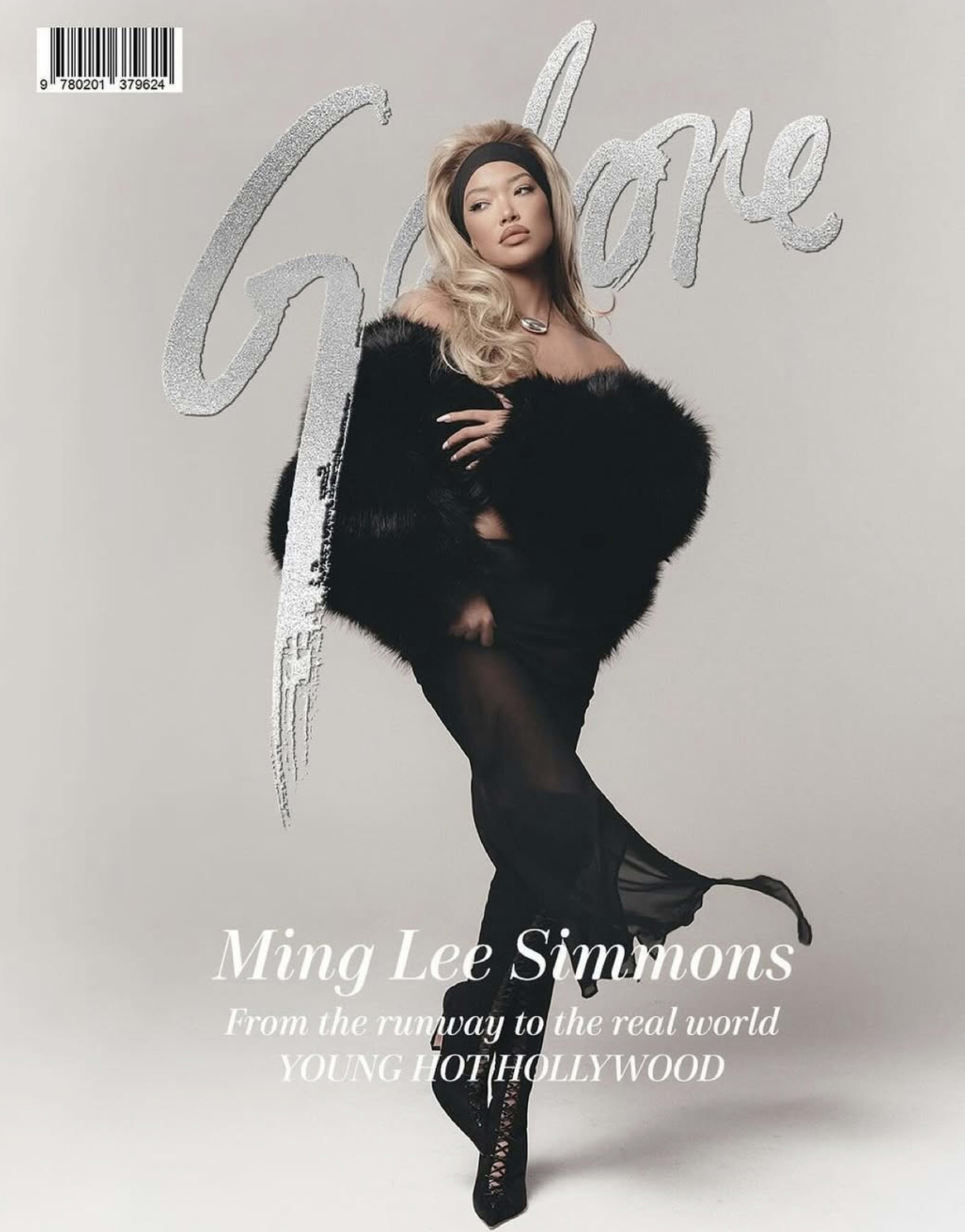 The image features a model in a black outfit with a fur coat, posing confidently for the cover of a magazine titled "Galore."