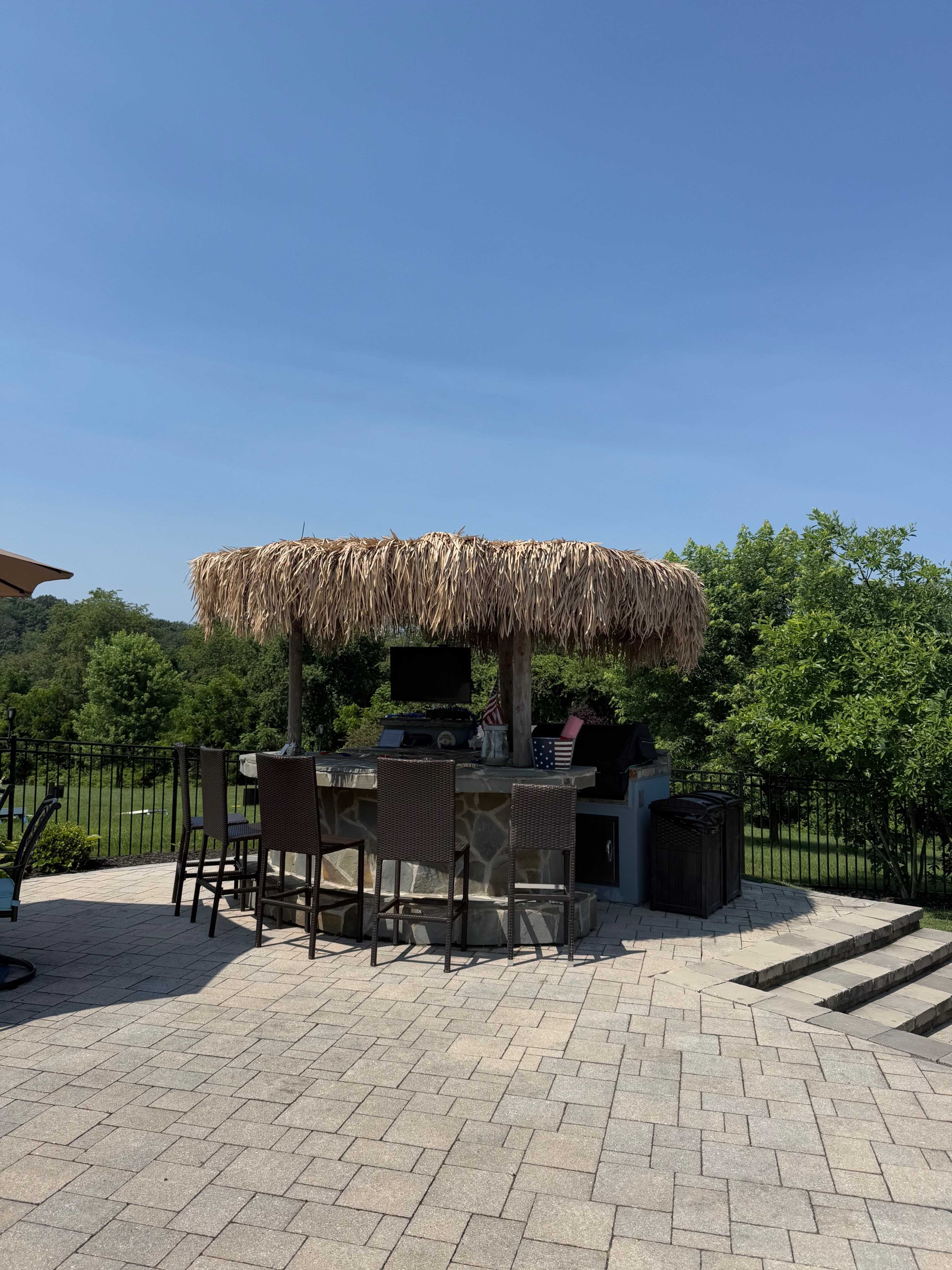 Modern Pool Oasis with Lush Privacy & Designer Lounge Area with Tiki Bar and Resort feel Image in , Westminster, MD