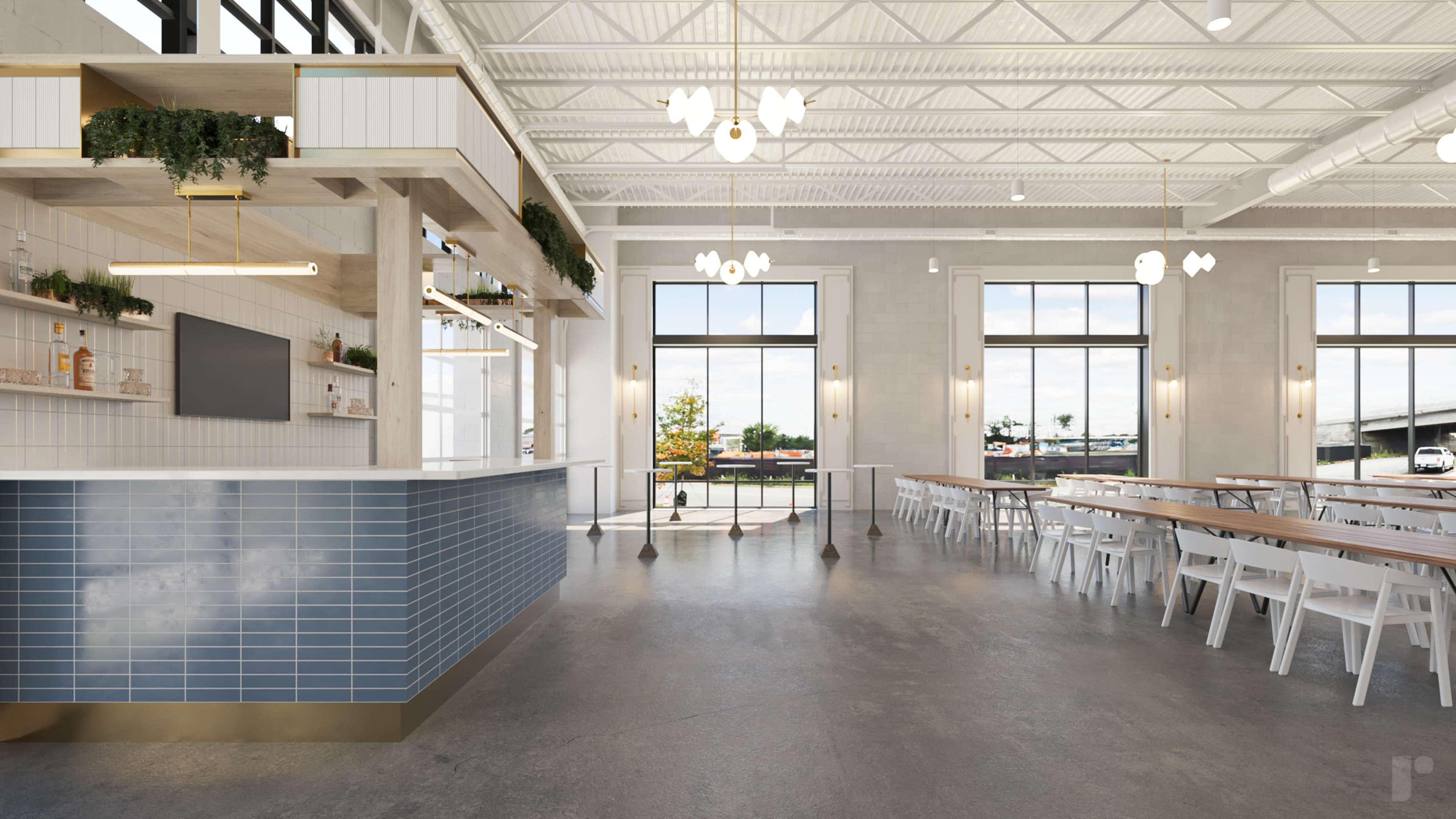 The image depicts a spacious, modern café with a blue-tiled counter, wooden tables arranged in a row, and large windows allowing natural light to fill the interior.