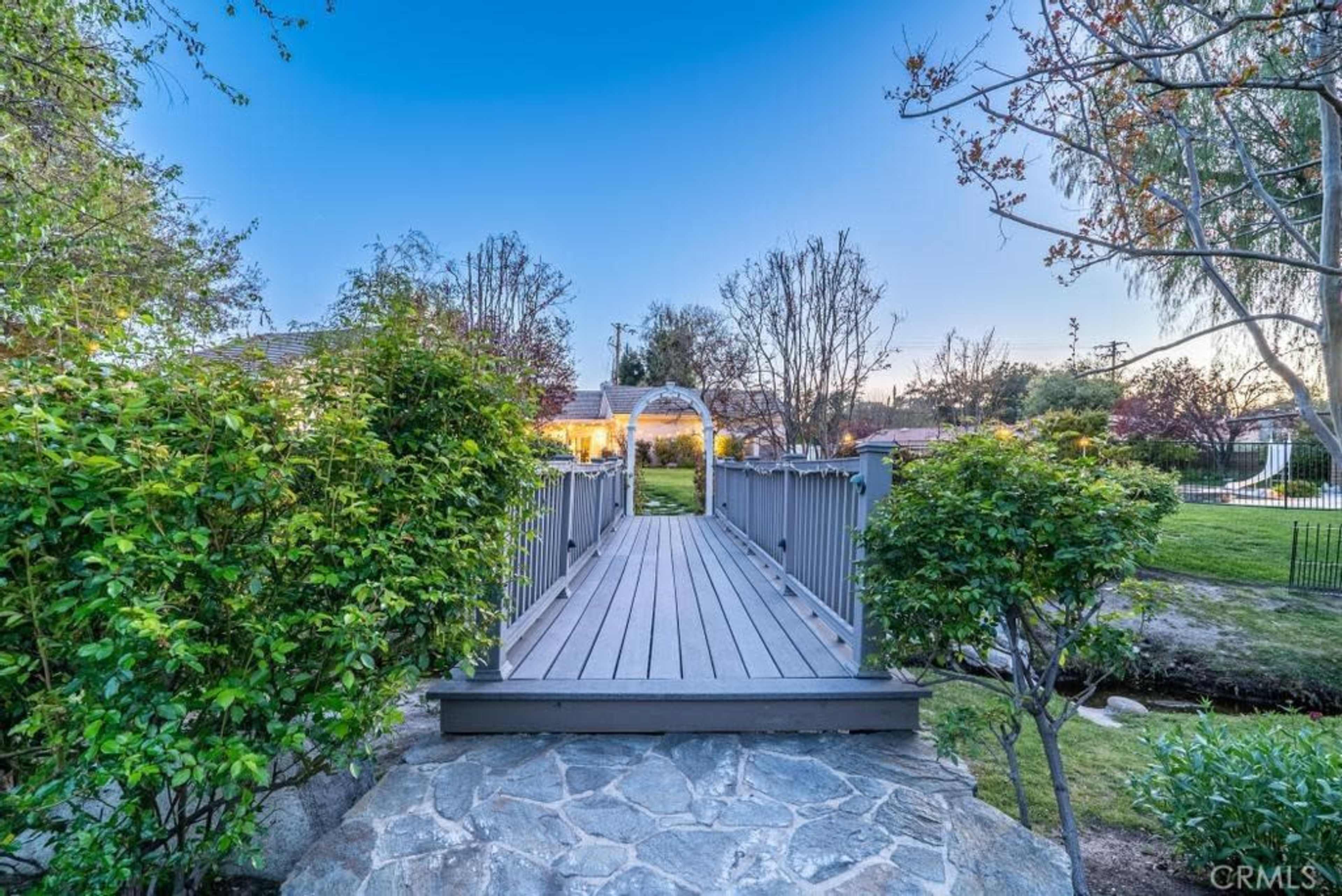 Expansive Outdoor Space with Pool, Lawn, Bridge and Amazing Scenery. Image in Canyon Country, Santa Clarita, CA