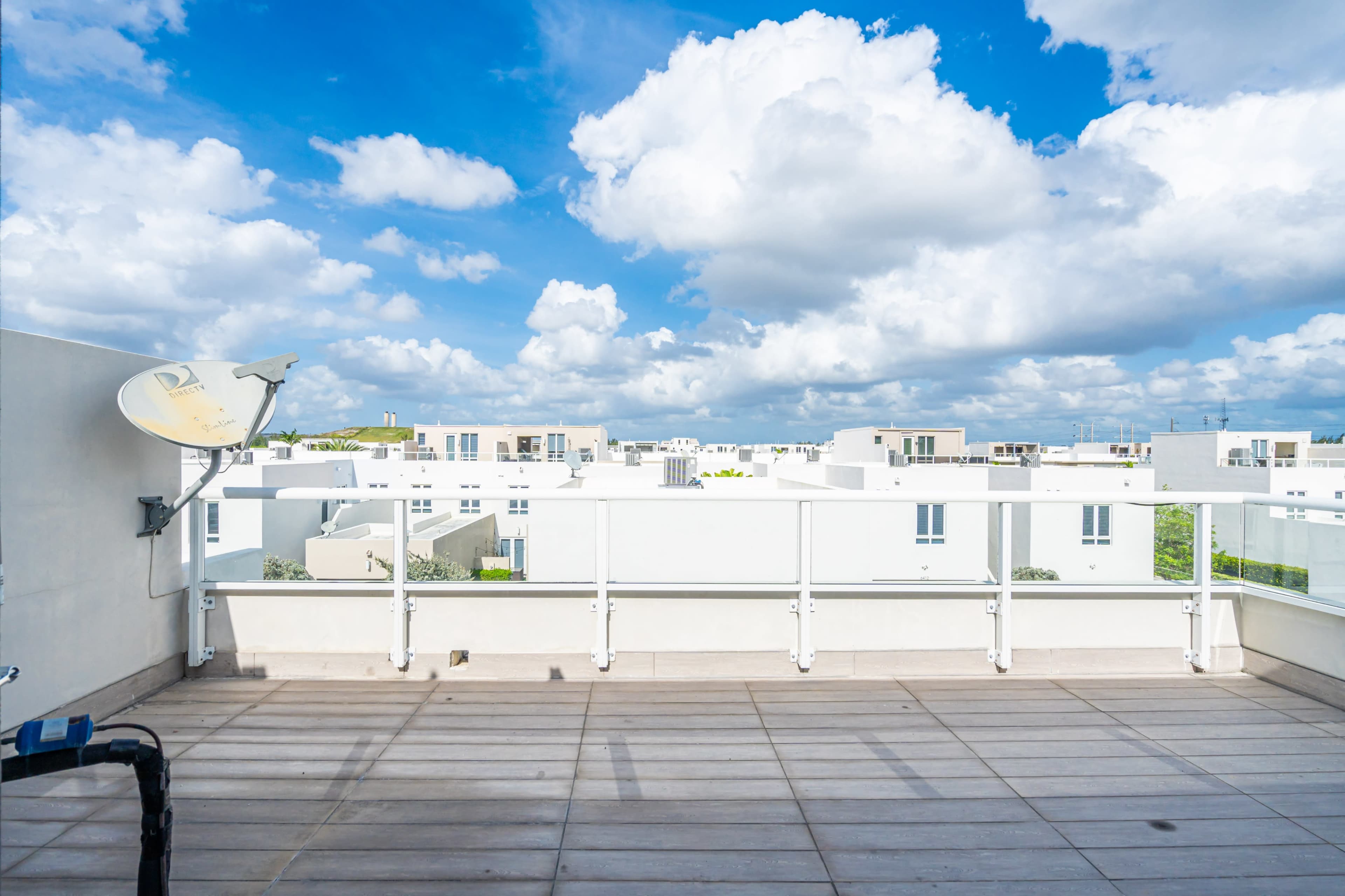 Sky-view Terrace with summer kitchen and mini fridge, four patios in different environments Image in Doral, Doral, FL