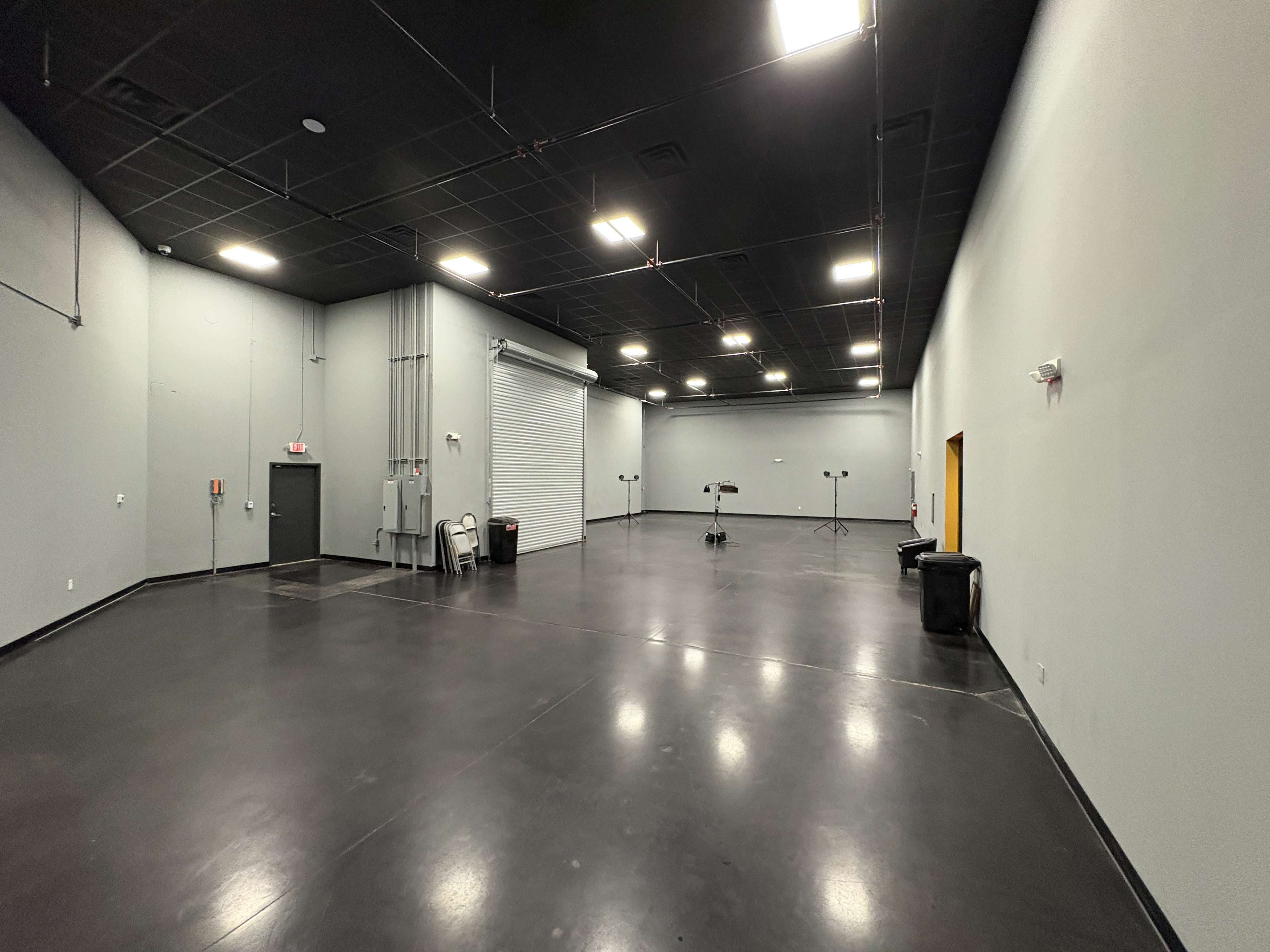 Sleek, Modern Creative Studio with Reception, Lounge & Warehouse Space — Perfect for Photo, Video, Events -  7 minutes from MCO Image in Airport North, Orlando, FL