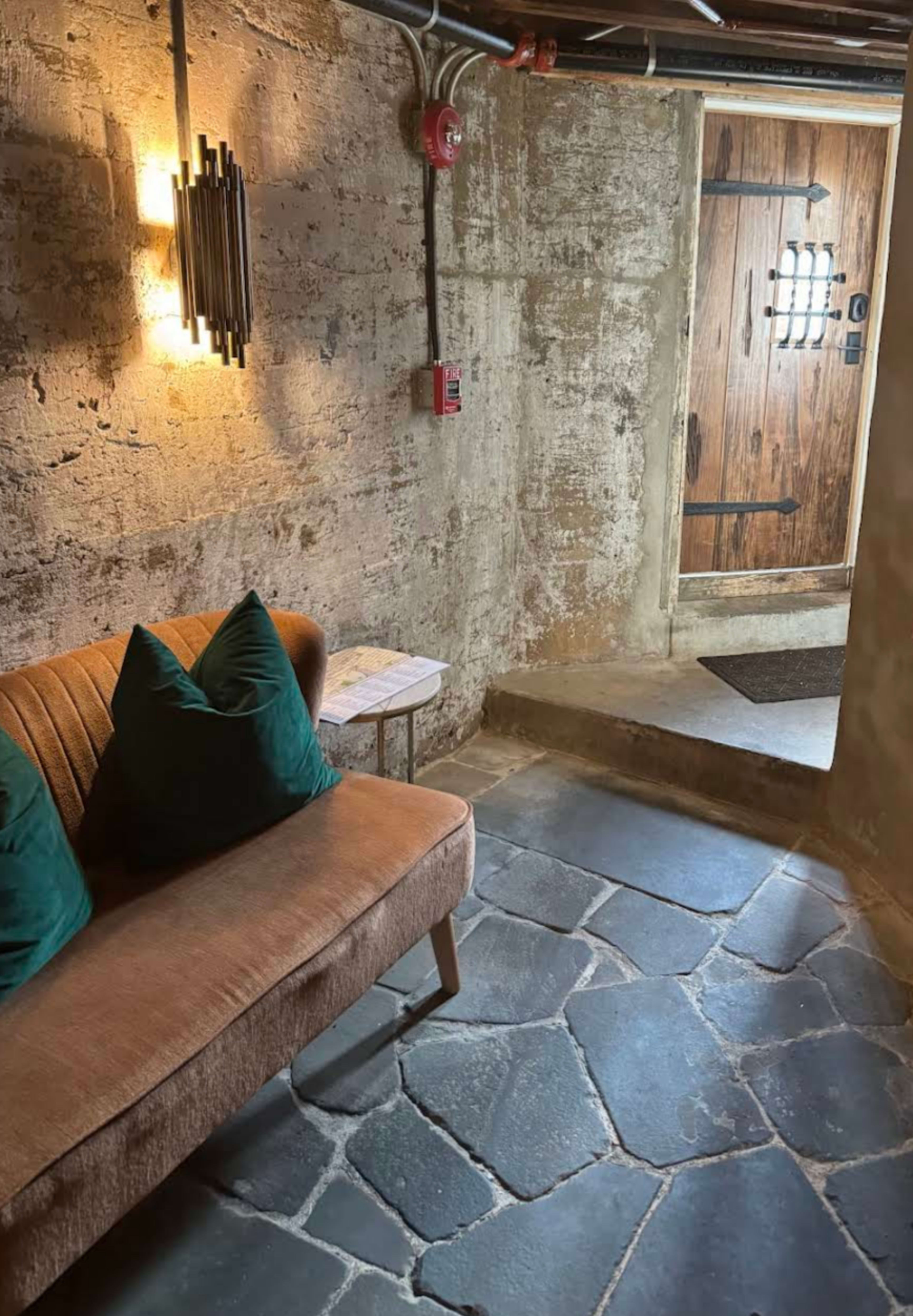 Heart of downtown Historic Abingdon, intimate totally private wine Cellar dining room/meeting space. Limestone walls, flagstone floors, 50" flat screen presentation HDMI. Image in Abingdon, Abingdon, VA