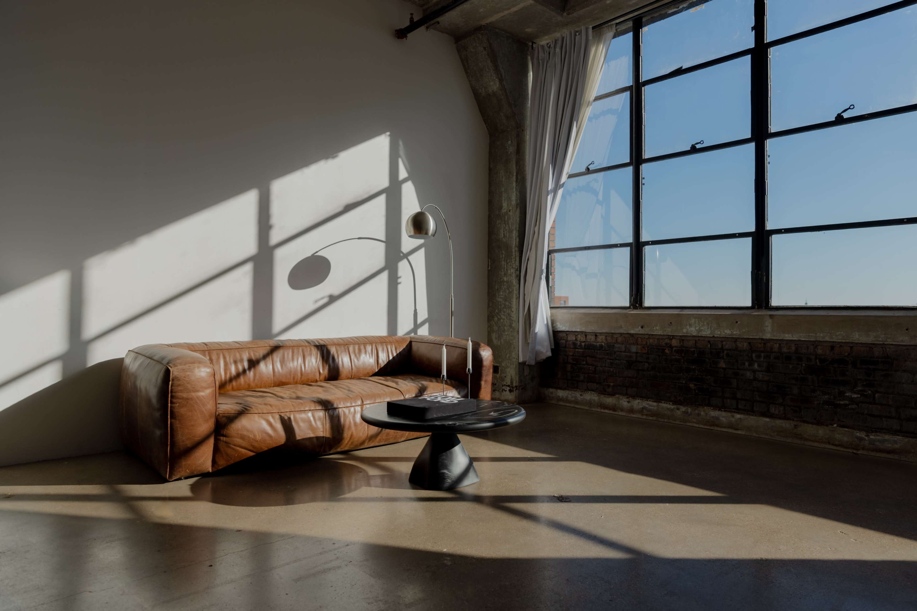 Bridgeport Natural Light Photography Studio | Mid-Century Modern Furniture | Tall Ceilings | South-Facing Windows Image in South Side, Chicago, IL