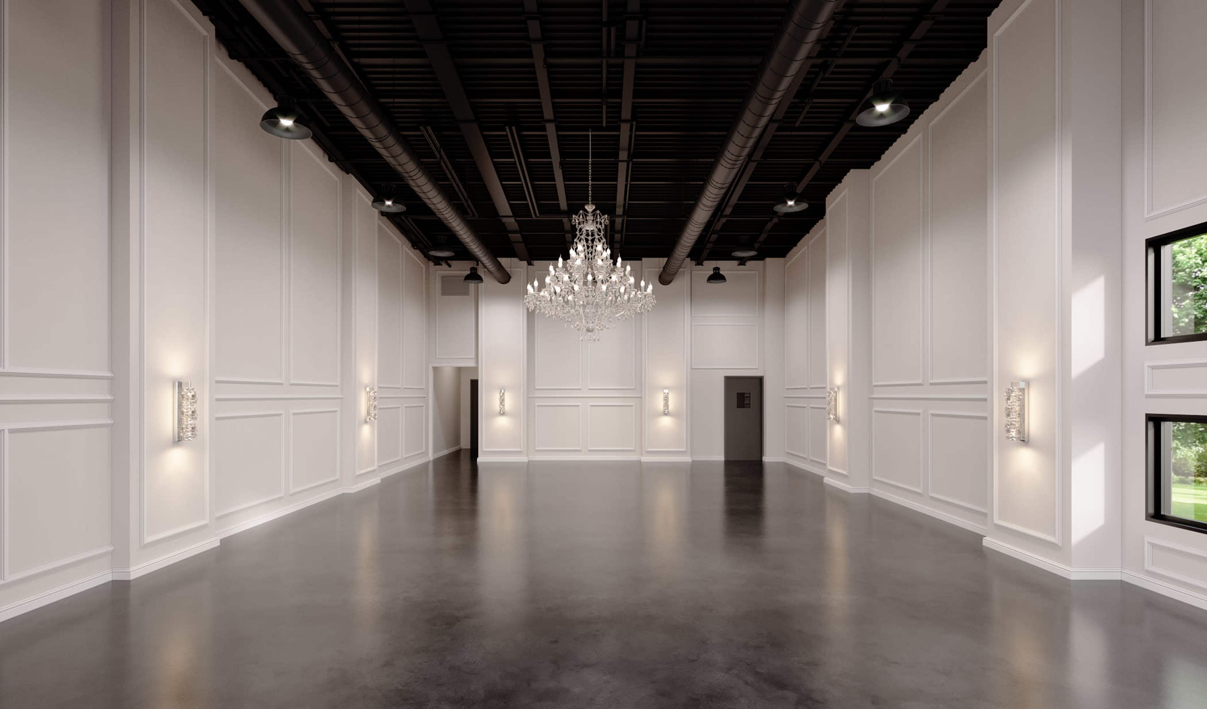 A spacious, elegantly designed interior room with white walls, a chandelier, and polished concrete floors.