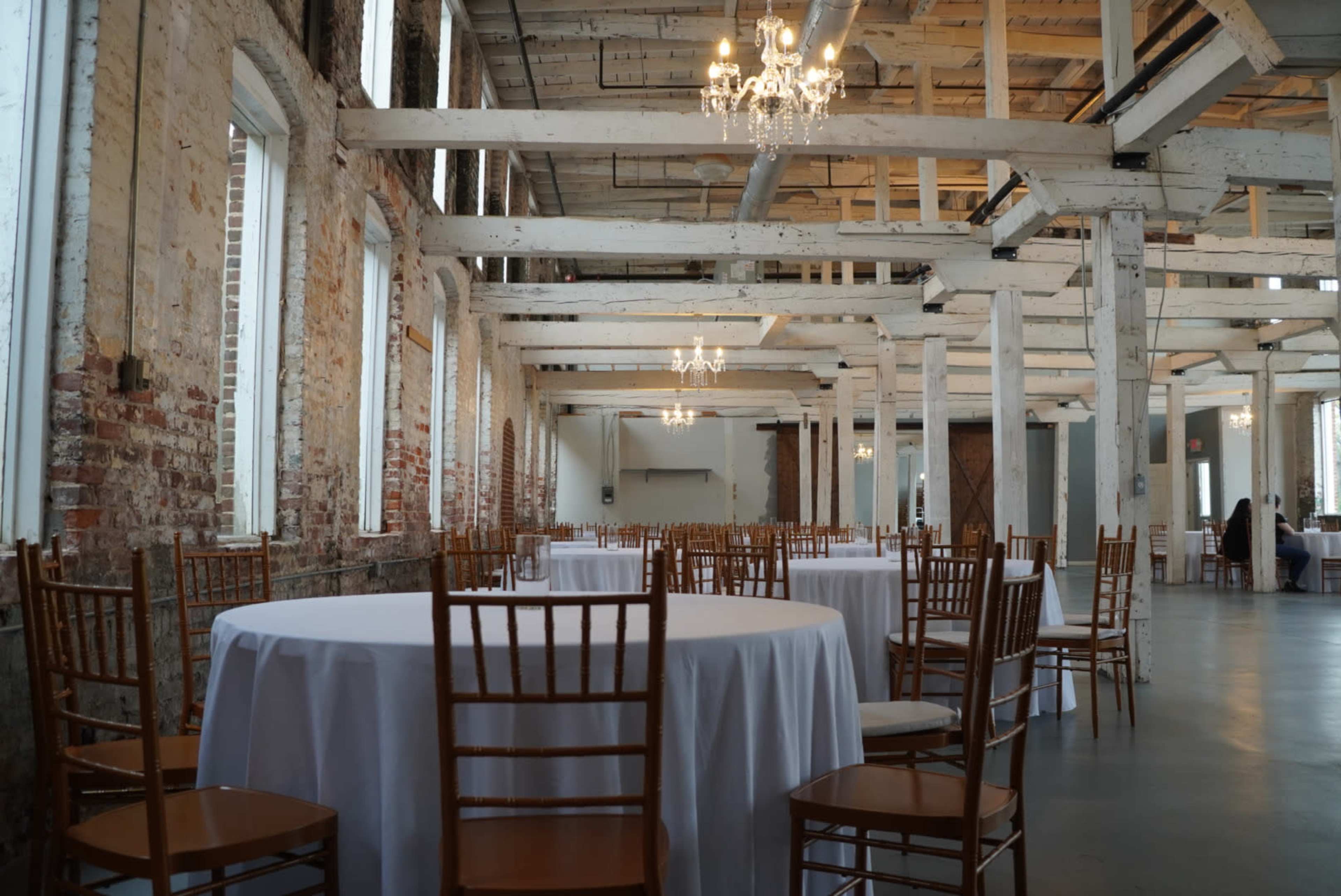 Historic Downtown Space with Exposed Brick and White Beams Image in Buford, Buford, GA