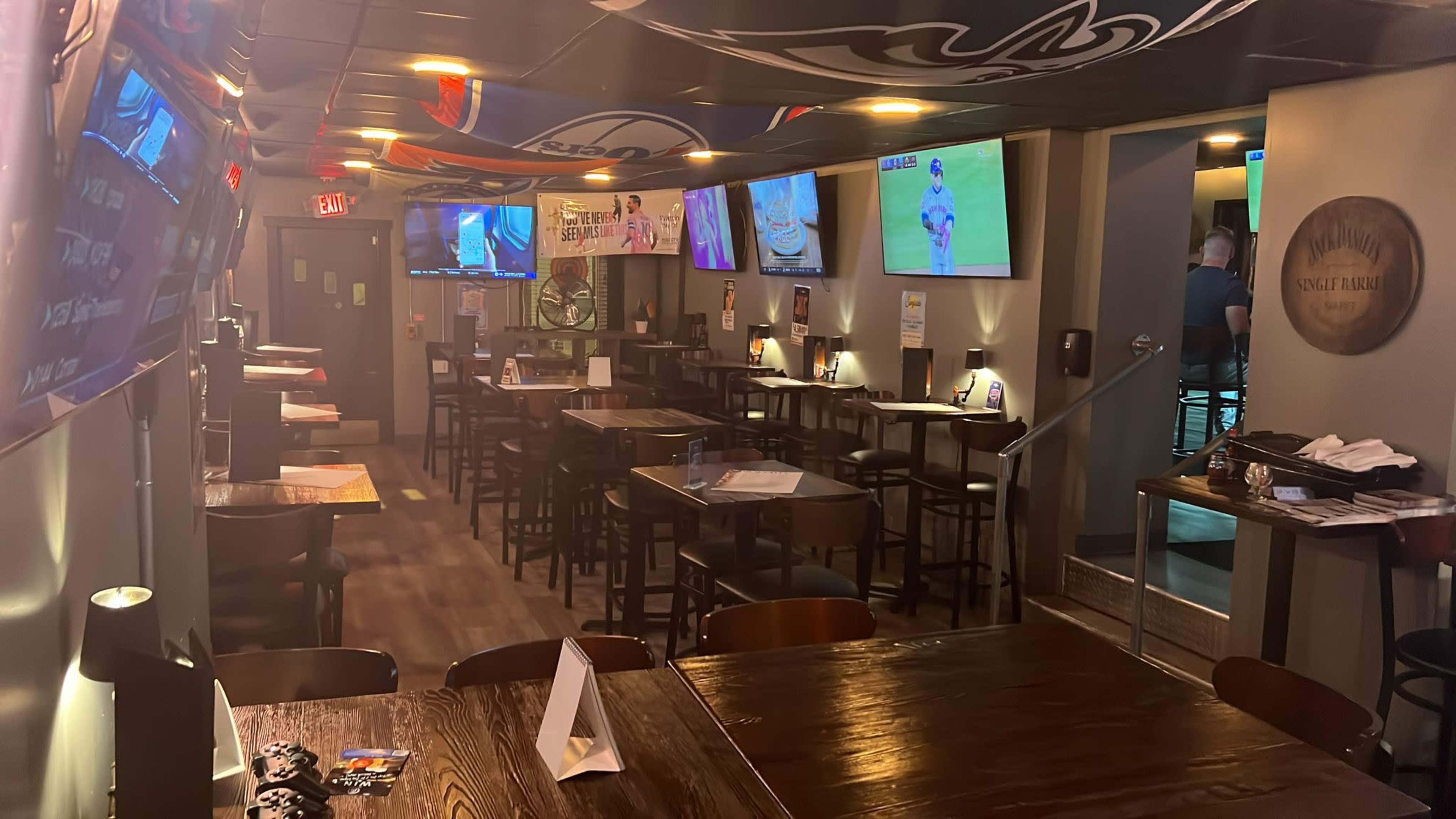 Cozy bar area with 10 flat screen TVs and surround sound speakers Image in Roxborough-Manayunk, PHILADELPHIA, PA