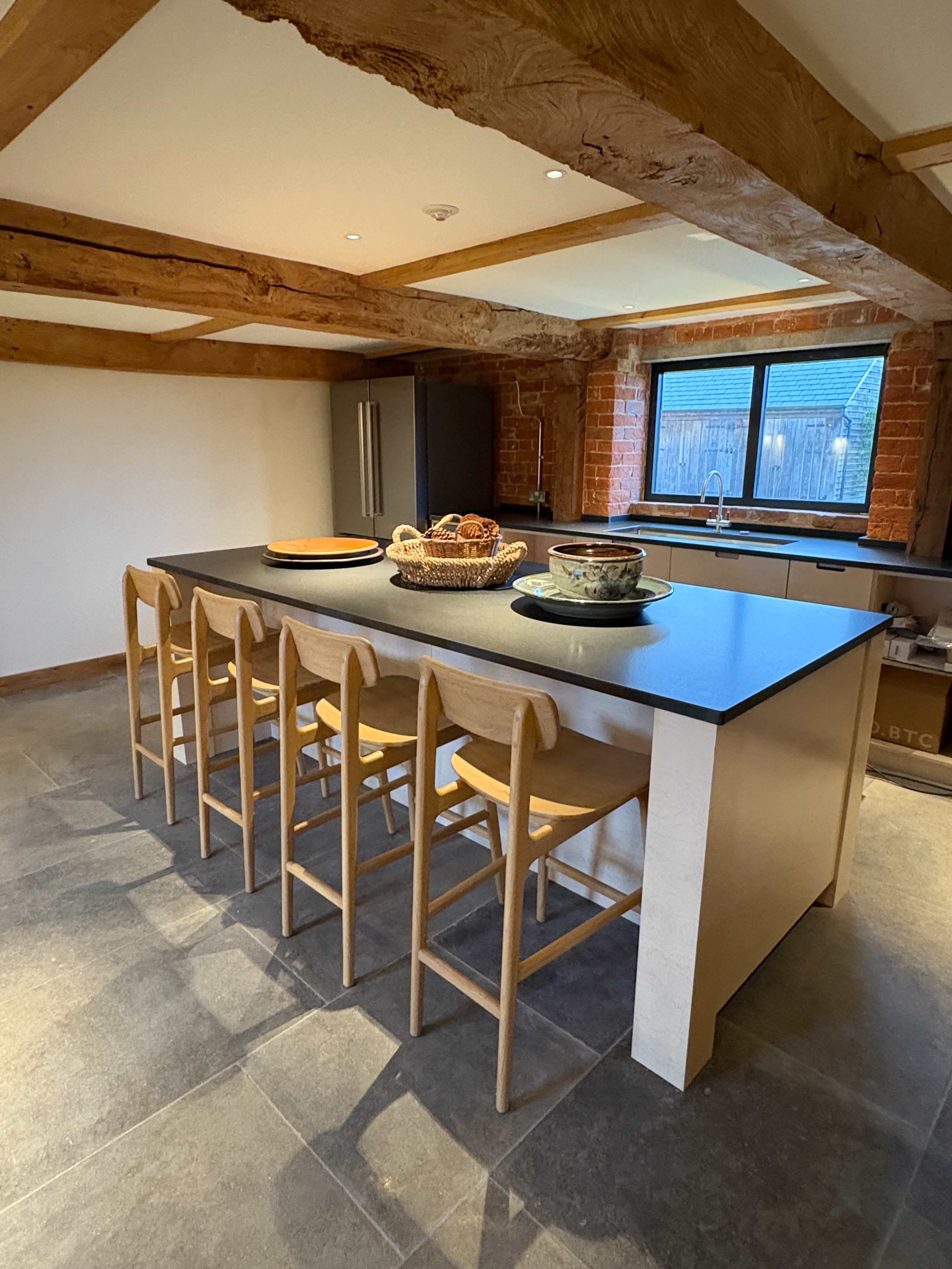 Unique barn space with floor-to-ceiling windows, exposed brick walls and a fully equipped kitchen Image in Edington, Westbury, ENG