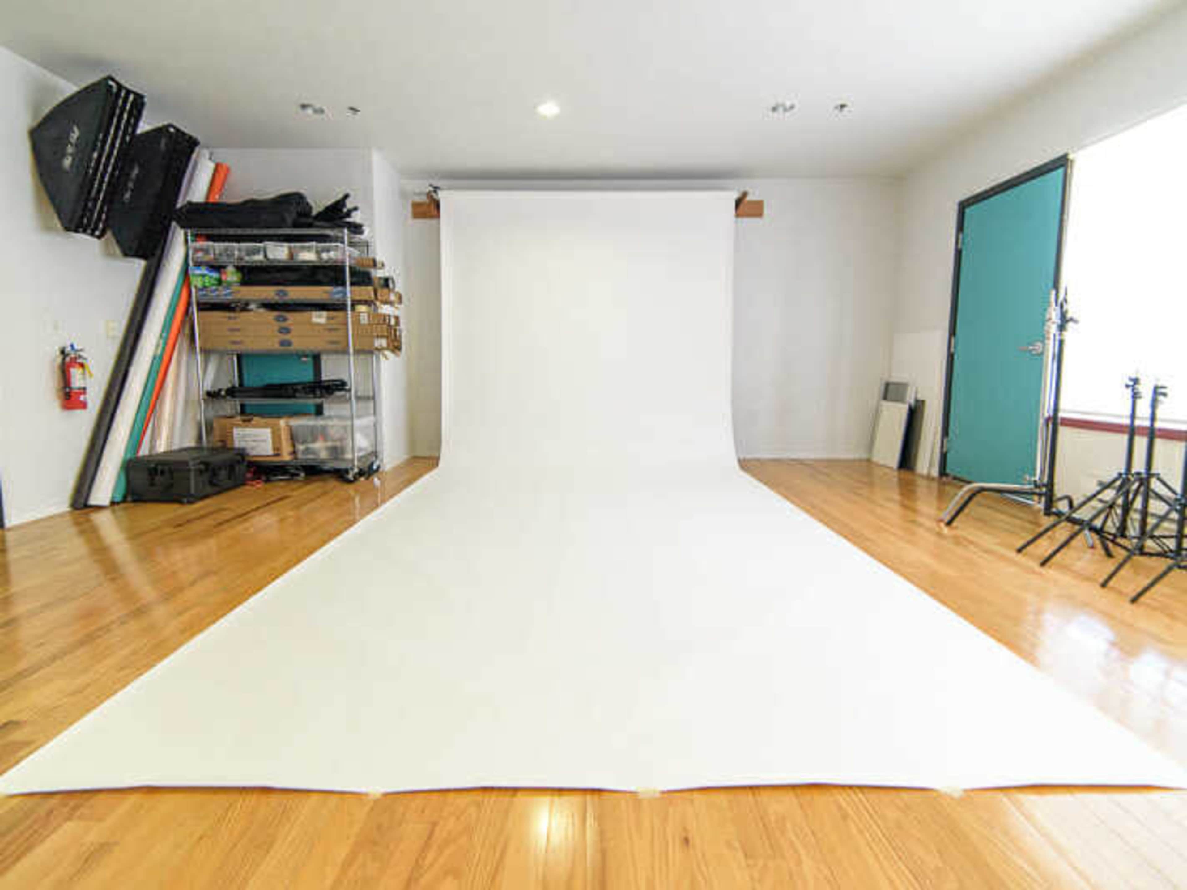  White Seamless Backdrop (107″ Width; Full Sweep)