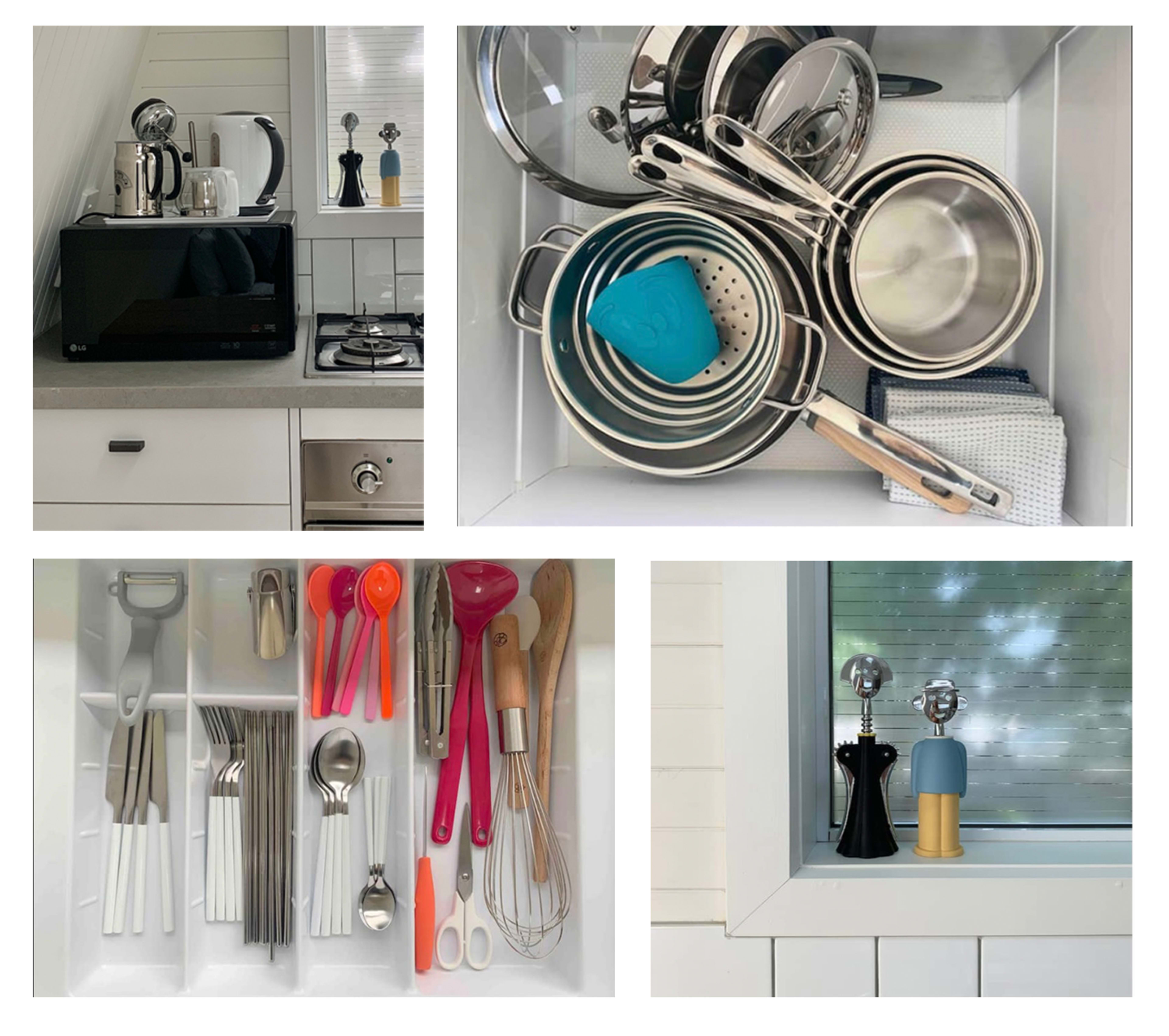 A kitchen scene featuring organized cookware and utensils, including pots, colanders, and cutlery.