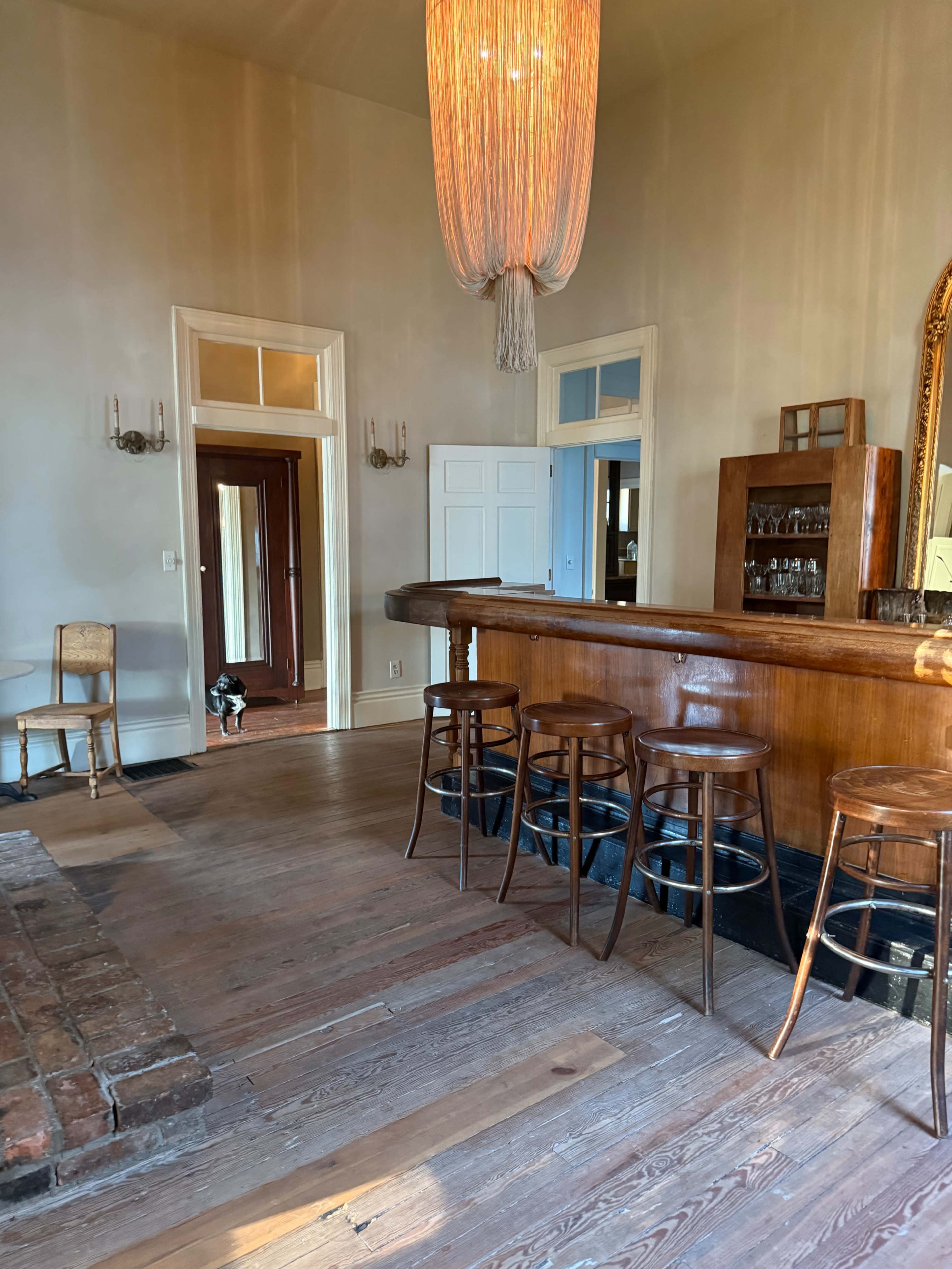 Brick Victorian with wrap around porch and exposed brick interior. Image in East Nashville, Nashville, TN