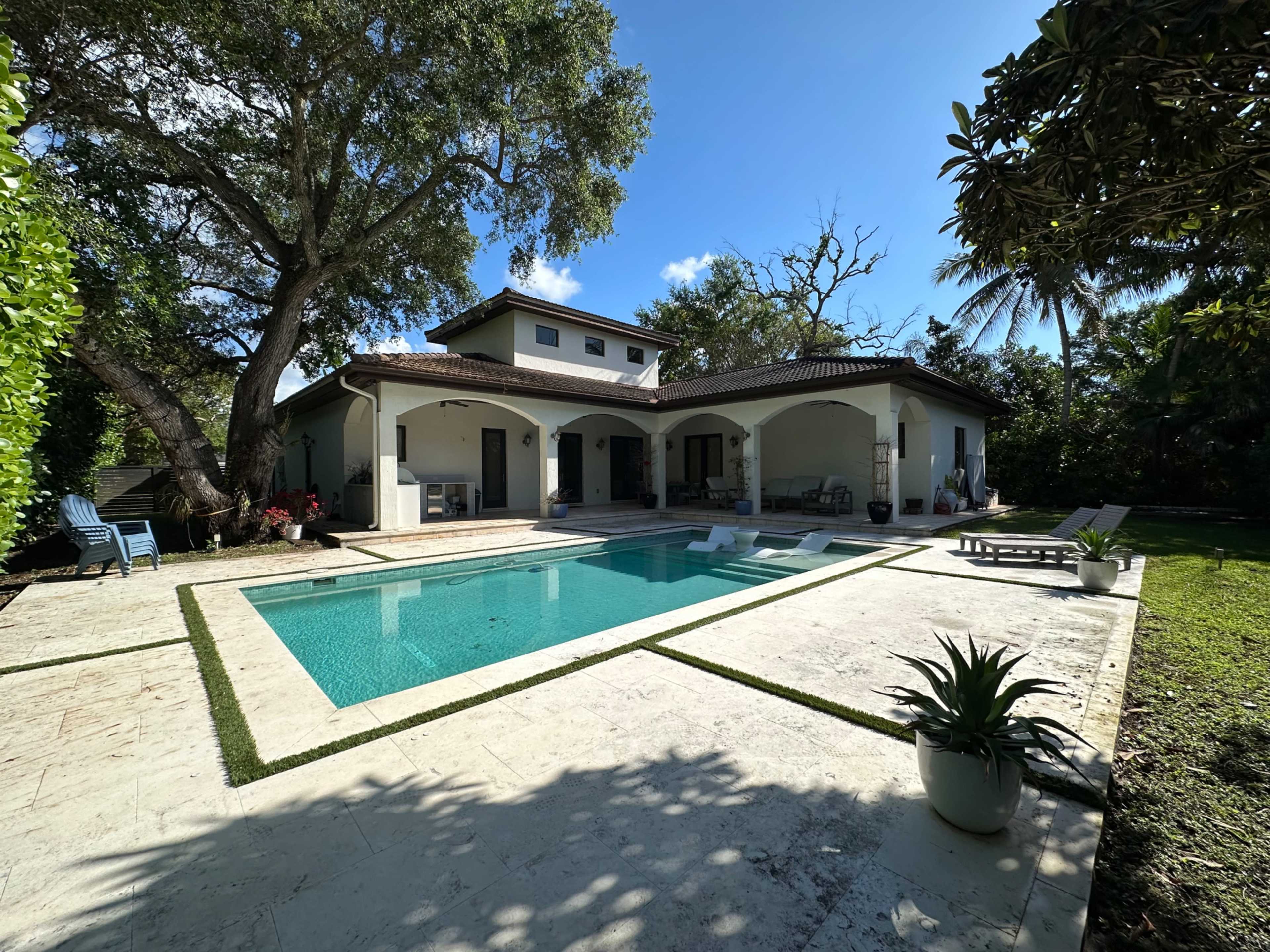 Private Garden Retreat with Pool, Oak Trees & Outdoor Kitchen Image in Glenvar Heights, Miami, FL
