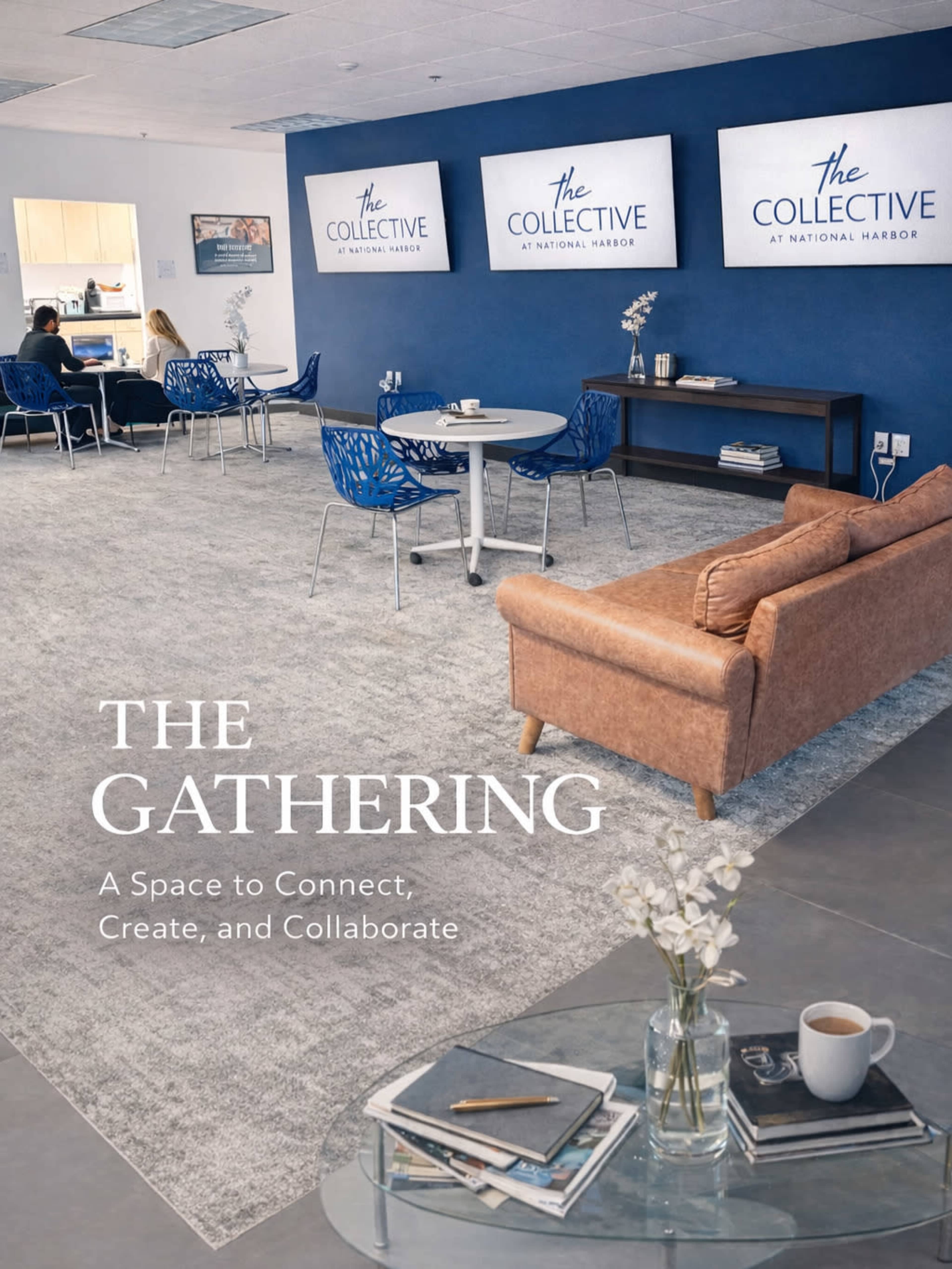 The image shows a modern co-working space with blue accent walls, a seating area featuring a couch and a coffee table, and multiple screens displaying the name of the space, "The Collective at National Harbor."