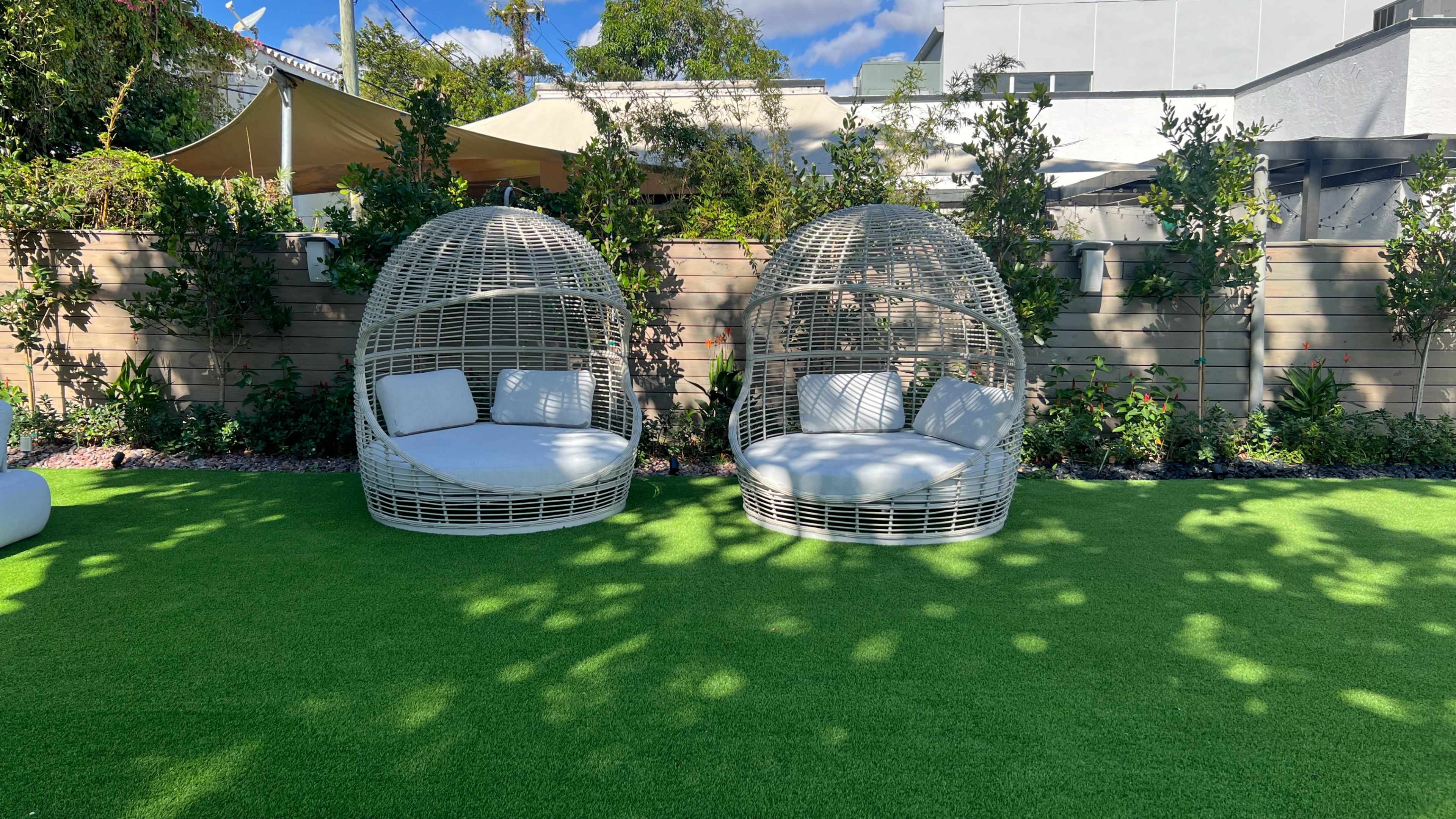 Beautifully landscaped backyard, with lighting, speakers and ambiance. Image in Miami, Miami, FL