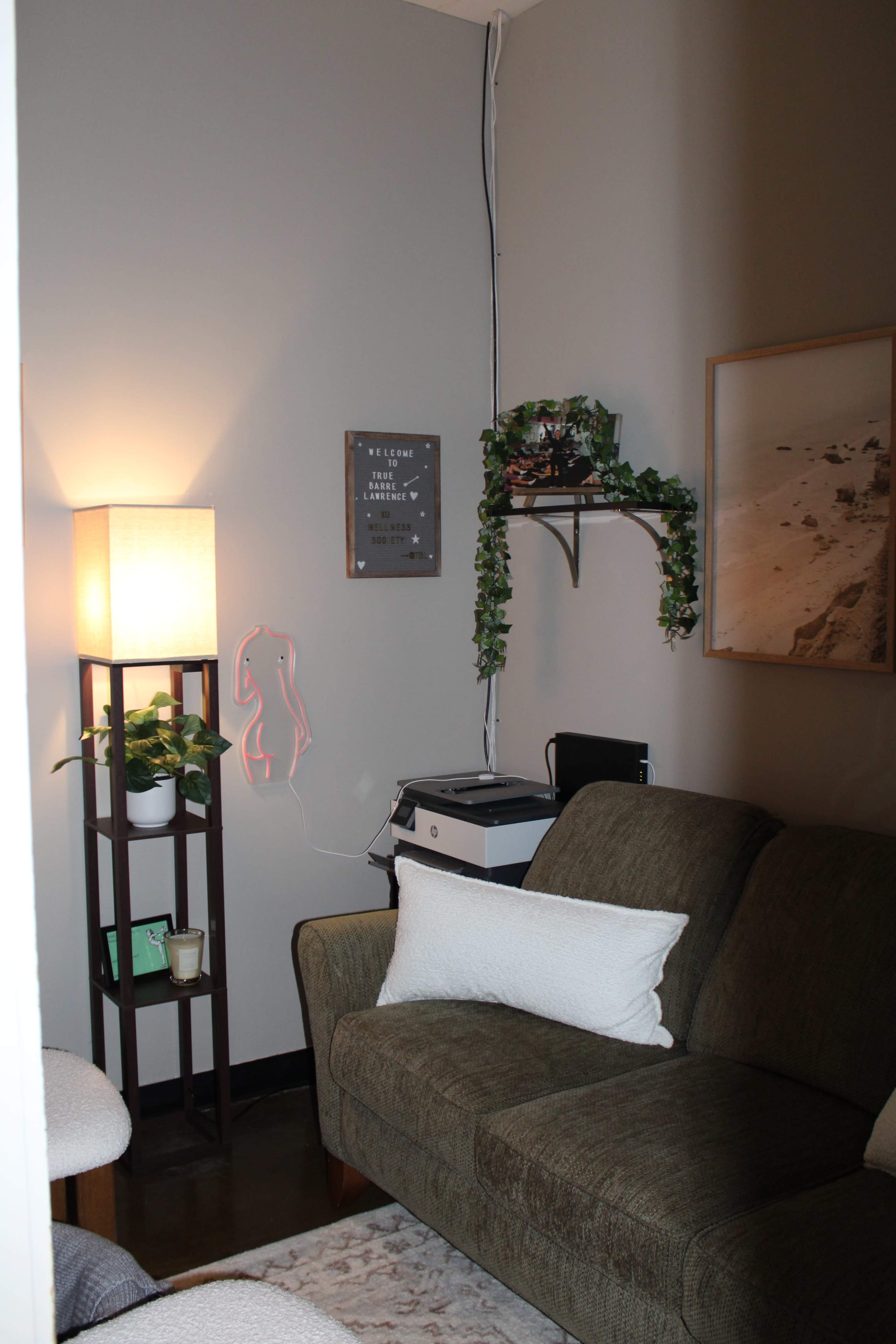 Urban area, open carpeted studio space for fitness, movement, dance, stretching, and more, comfortable and homey yet open, studio space, lobby and office area. Image in Lawrence, Lawrence, KS