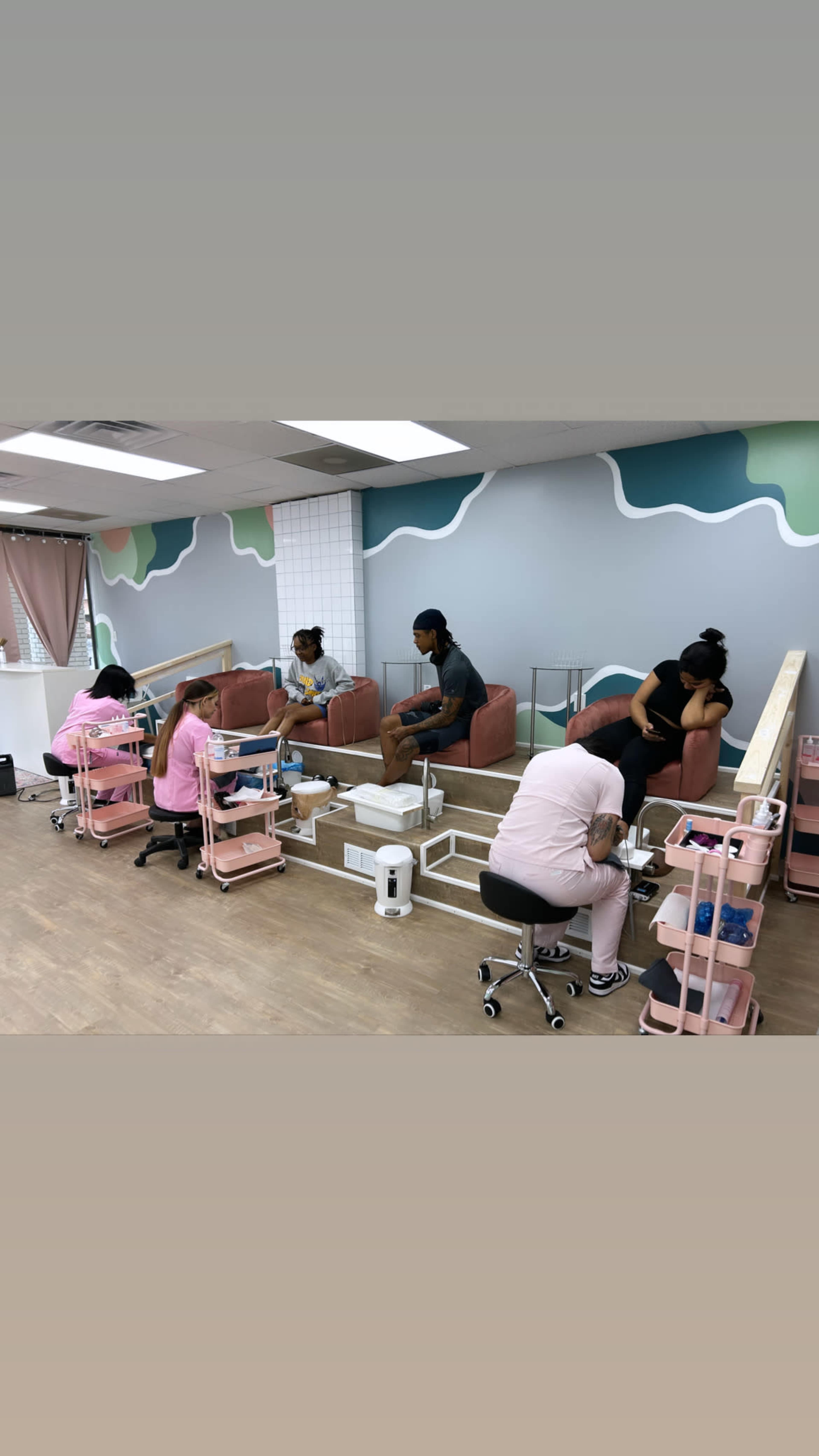 Suburban, retro modern nail salon with bright and colorful decor. Image in , Marietta, GA