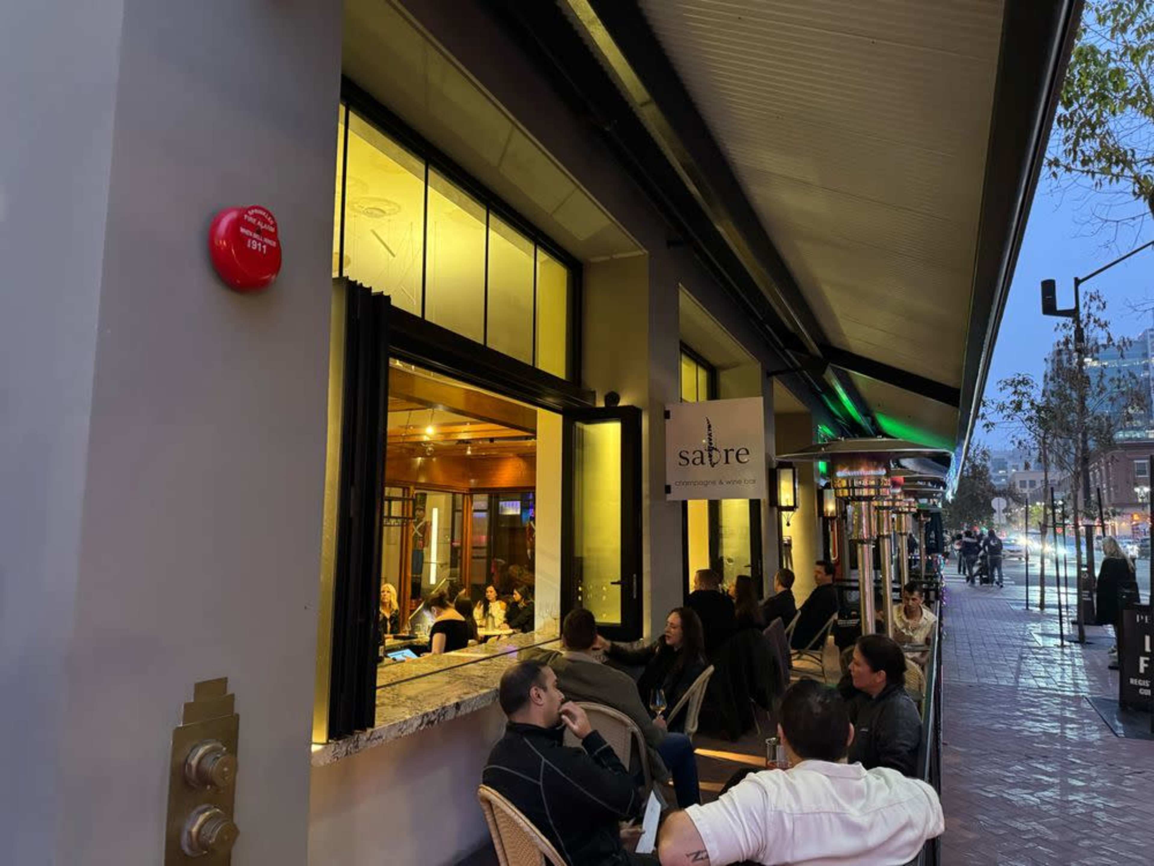Chic space featuring an elegant wine bar with outdoor patio seating Image in Asian Pacific Thematic Historic District, San Diego, CA
