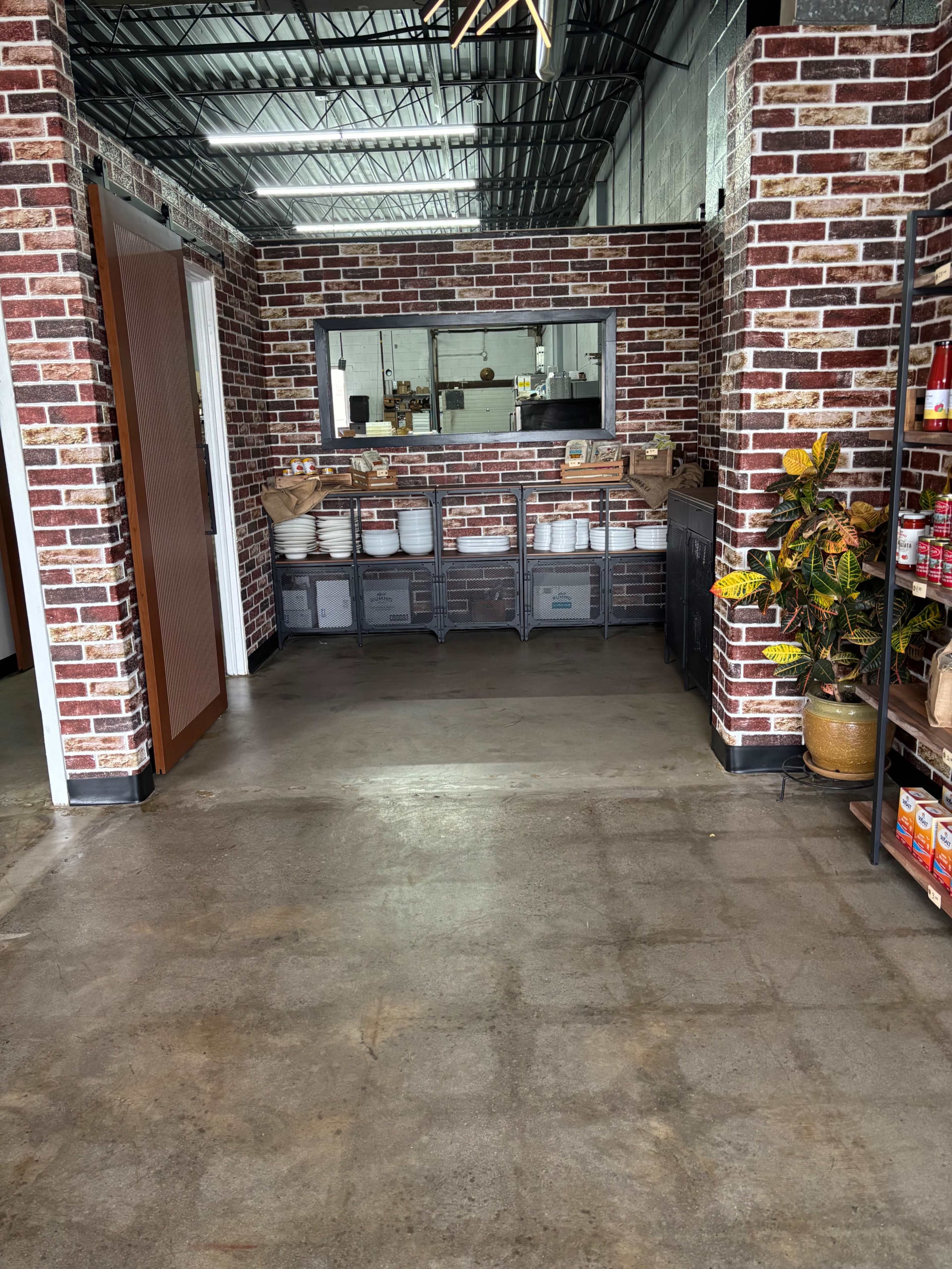 Modern industrial inspired retail space with commercial kitchen Image in Humber Summit, Toronto, ON