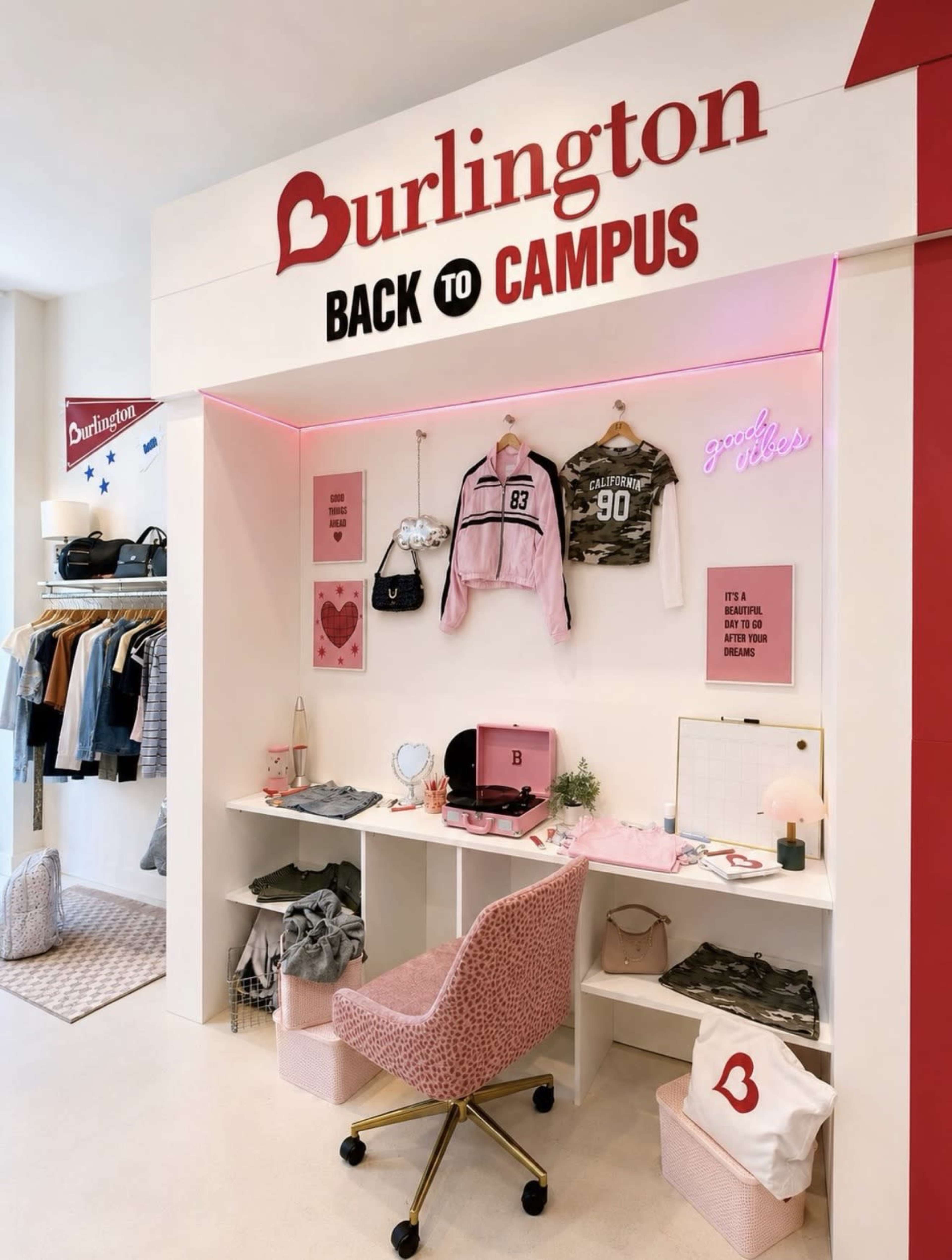 The image shows a stylish retail display for Burlington's "Back to Campus" collection, featuring clothes on hangers, a desk with a chair, and decorative items including clothing and accessories.