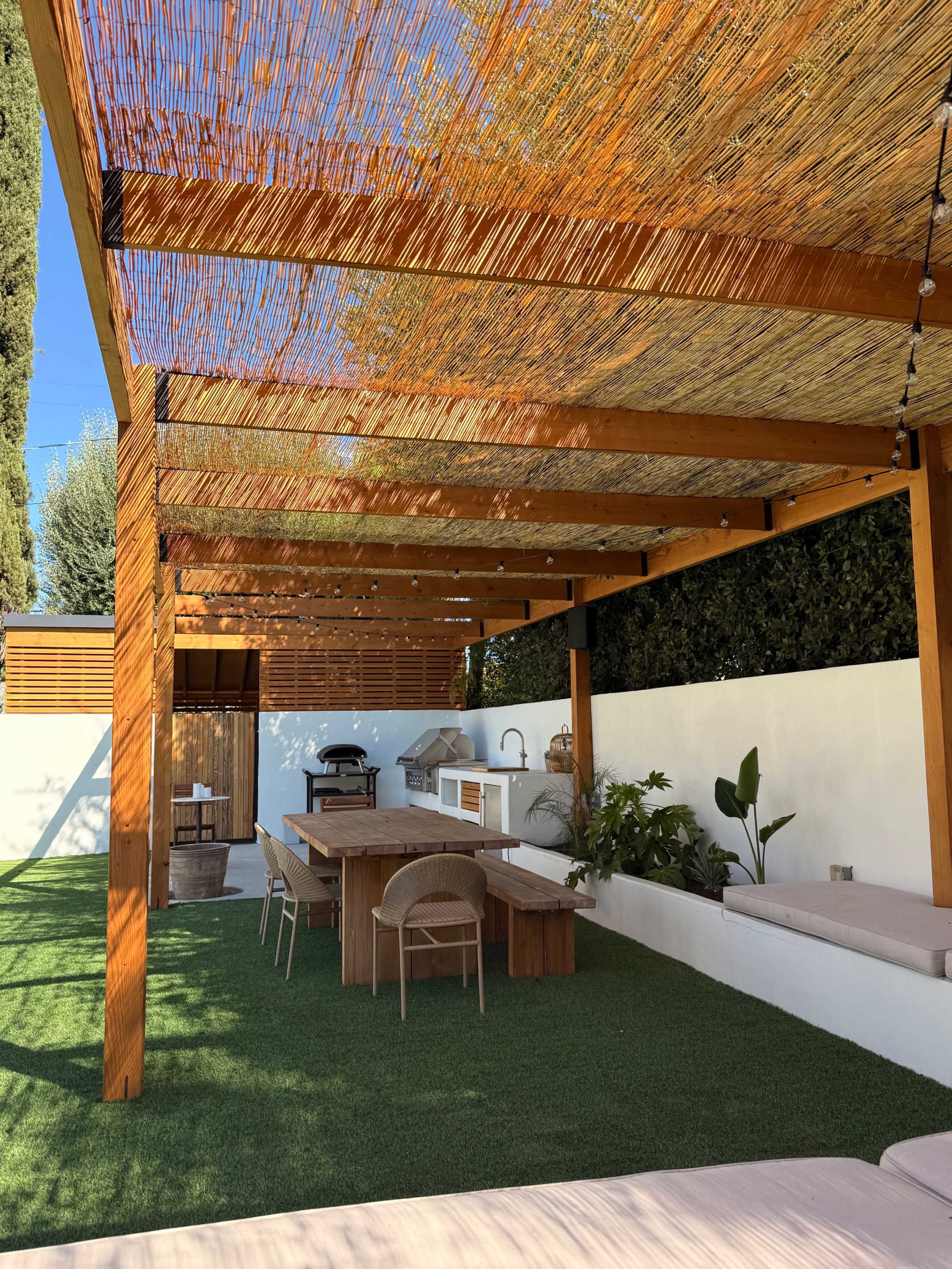 Resort-Style Backyard with Pool, Pergola, Firepit & Outdoor Kitchen Image in Woodland Hills, Woodland Hills, CA