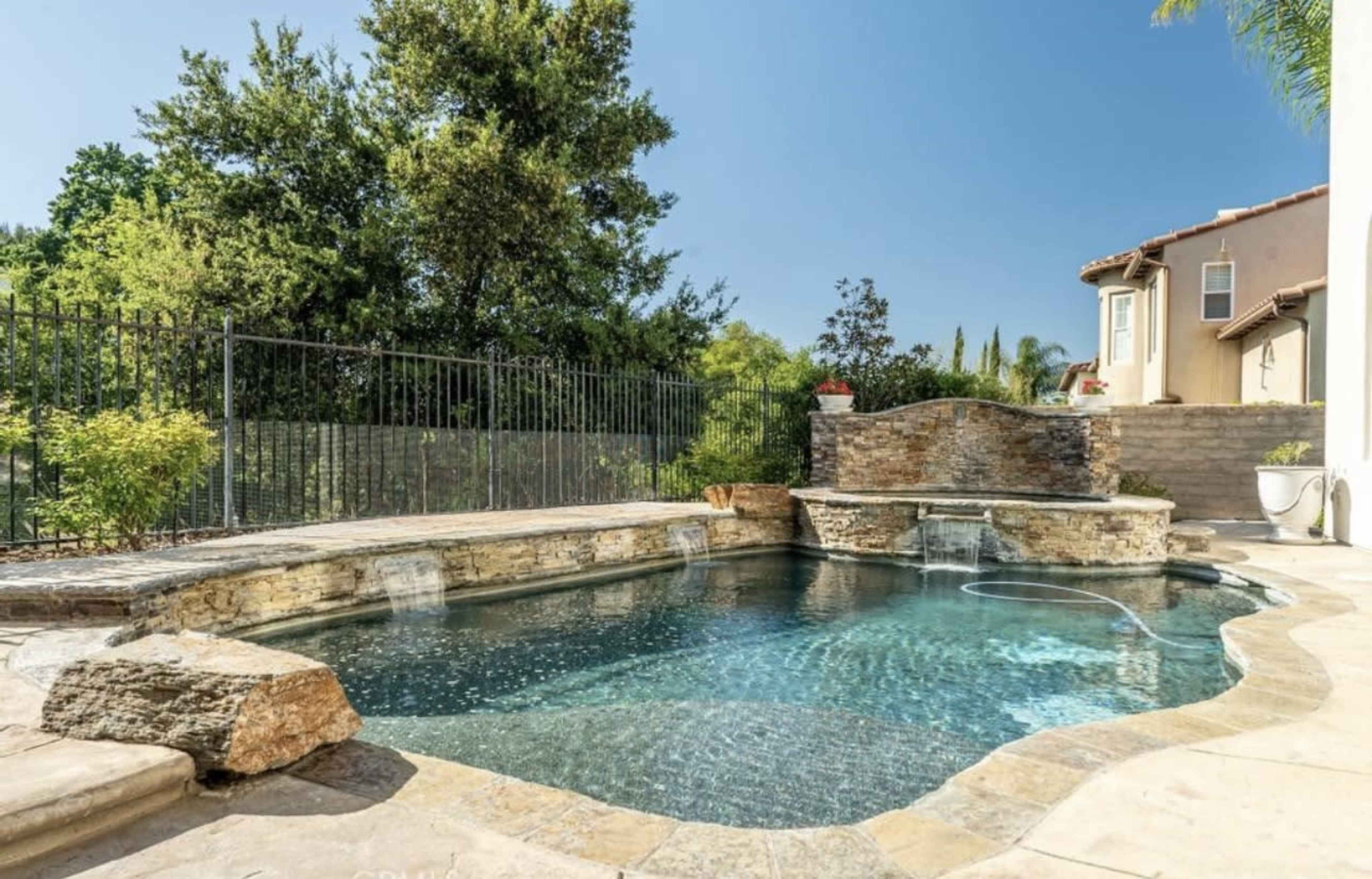 Grand Mediterranean Estate: Double Staircase, Resort Pool & Open Views Image in Valencia, Valencia, CA