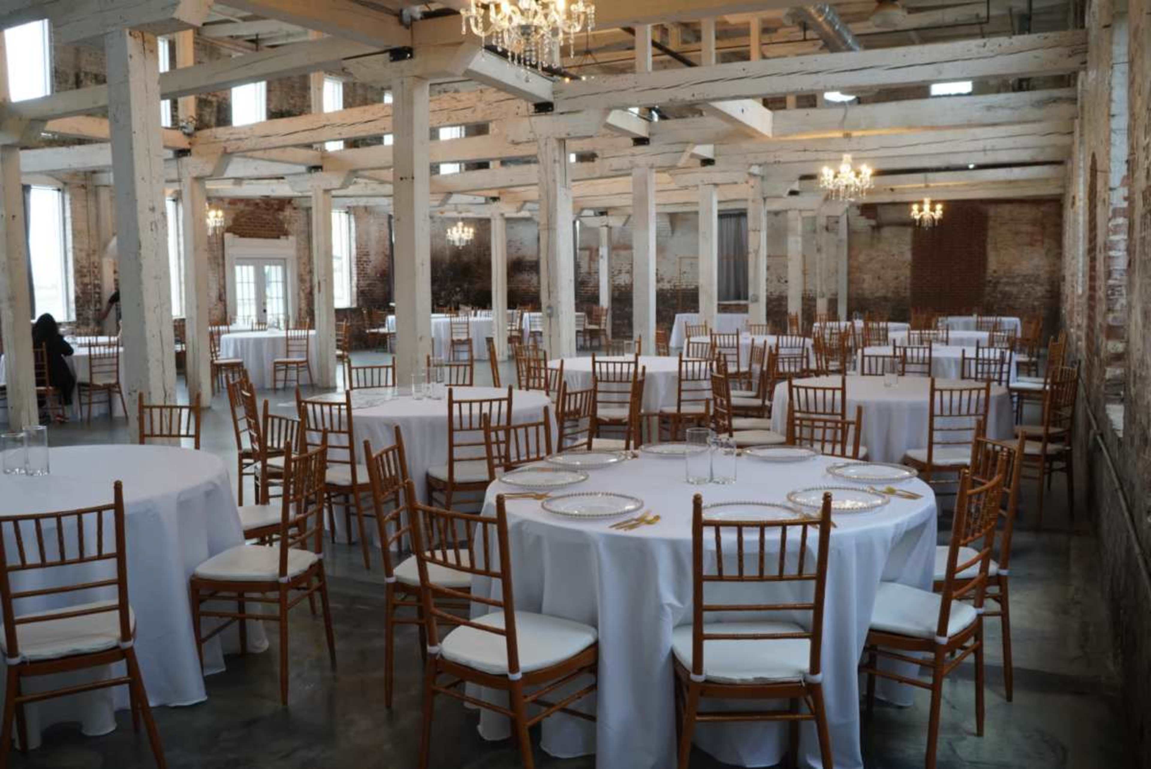 Historic Downtown Space with Exposed Brick and White Beams Image in Buford, Buford, GA
