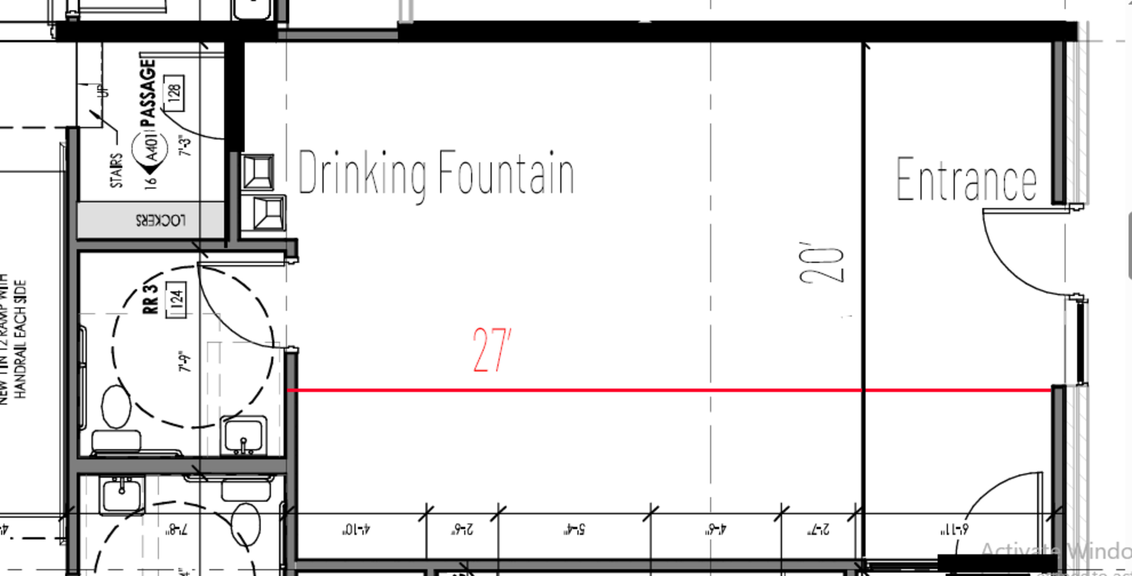 The image shows a floor plan layout featuring an entrance and a drinking fountain labeled in a designated space.