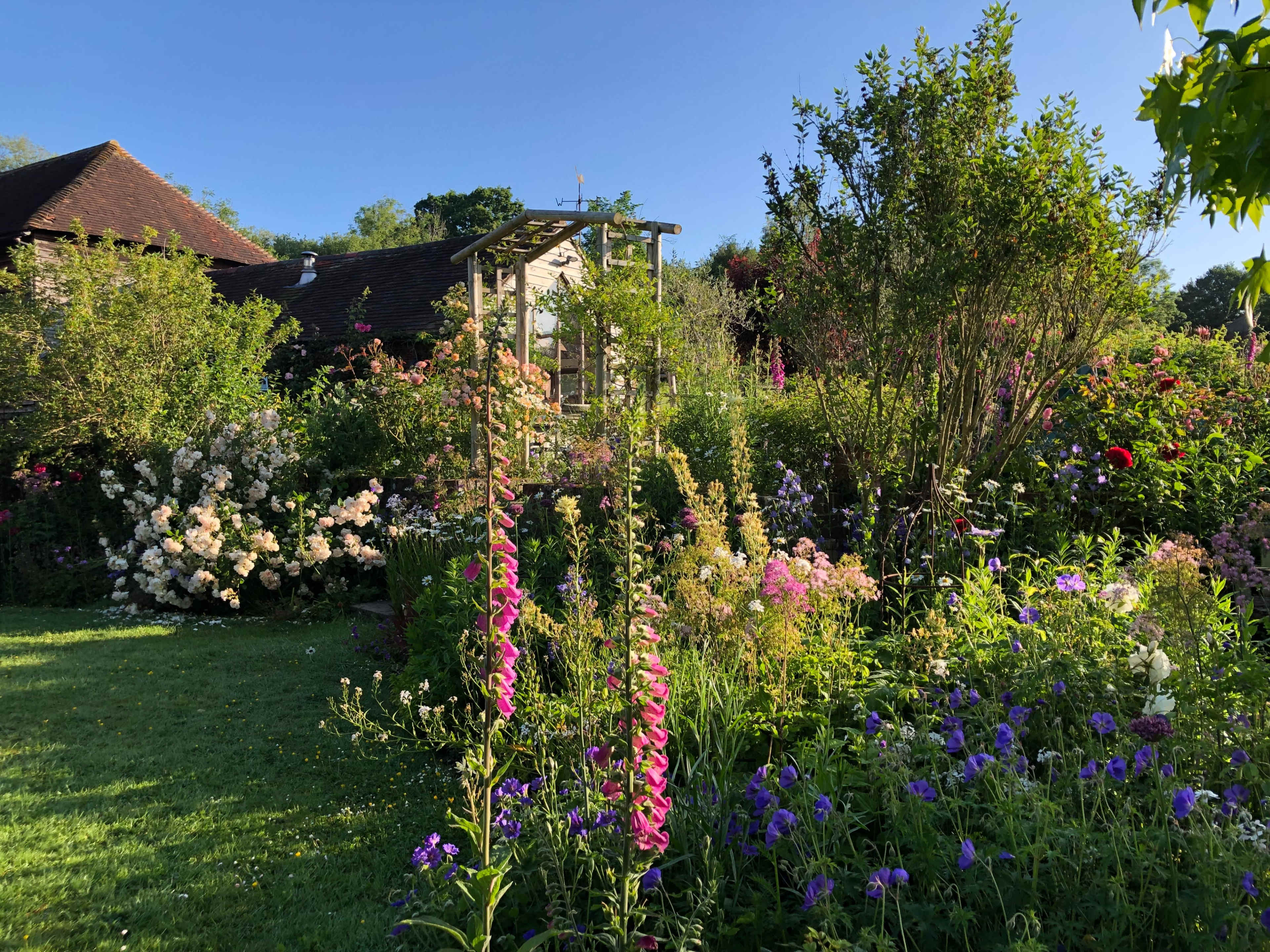 English Country Gardens with 17th century timber framed Sussex farmhouse. Image in Barcombe, Barcombe, ENG