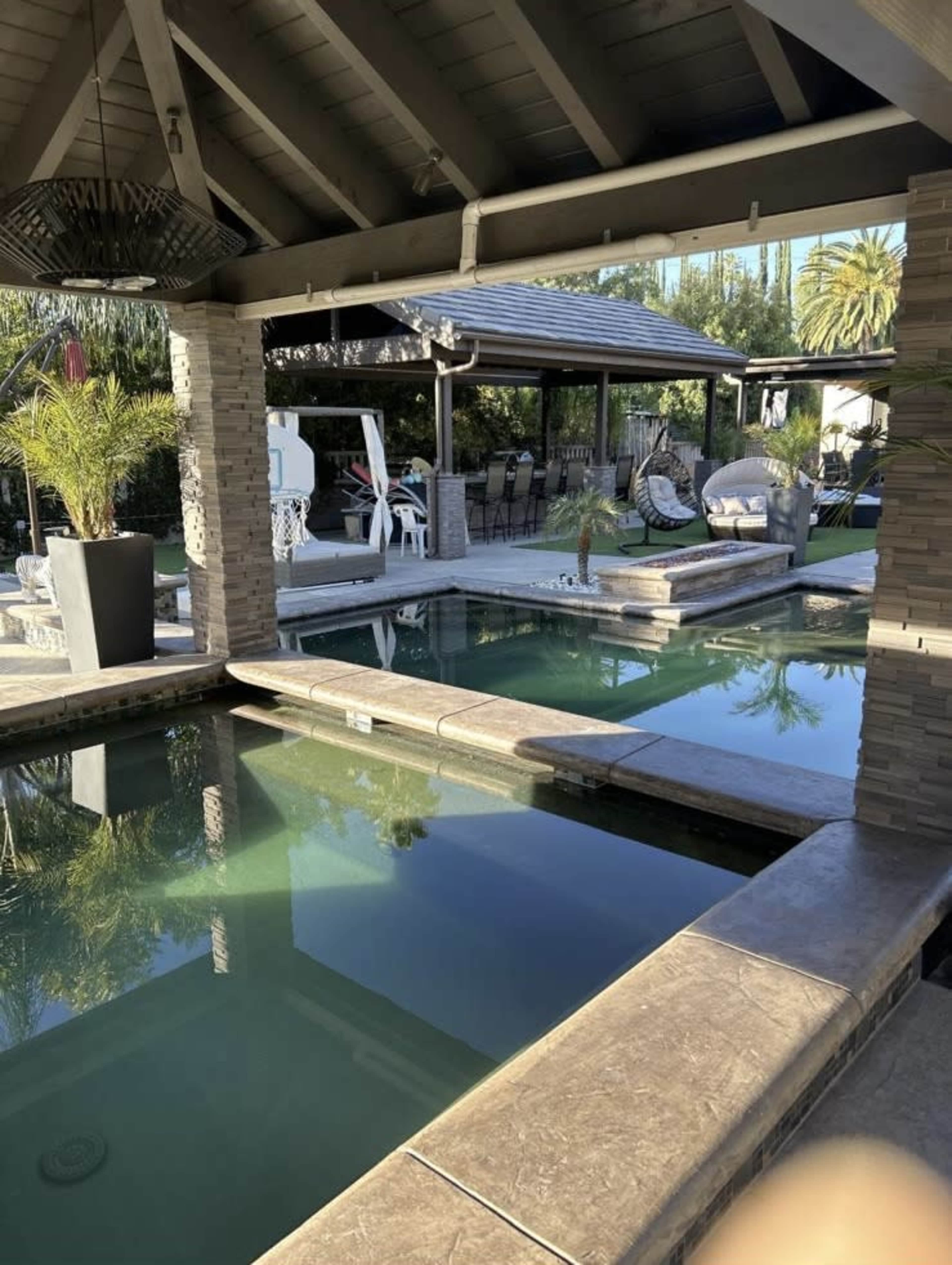 Luxury Oasis Backyard with Pool, Spa, BBQ, and Fire Features Image in Tarzana, Tarzana, CA