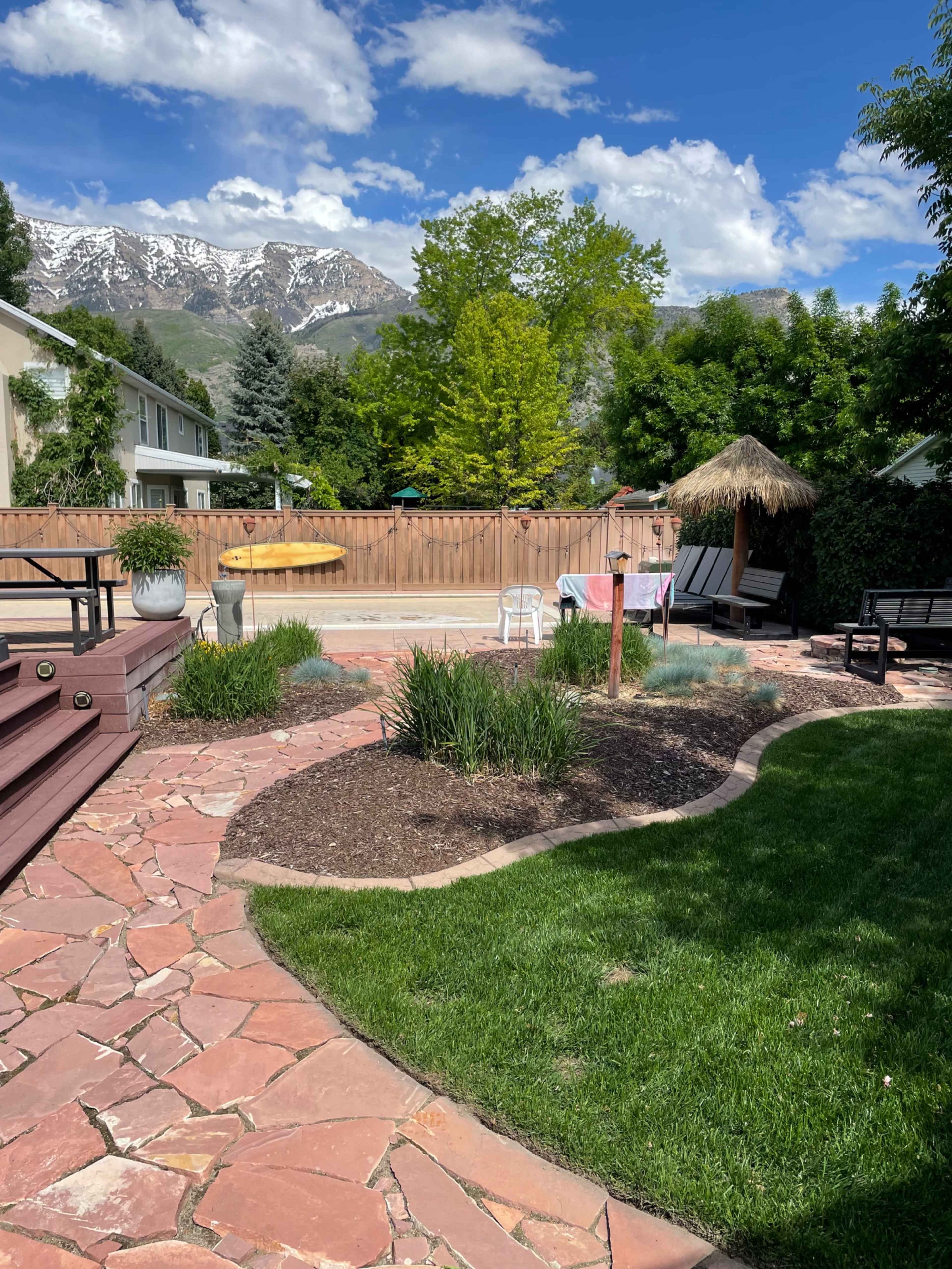 Beachy style home surrounded by mountains with a swimming pool Image in River Bottoms, Provo, UT