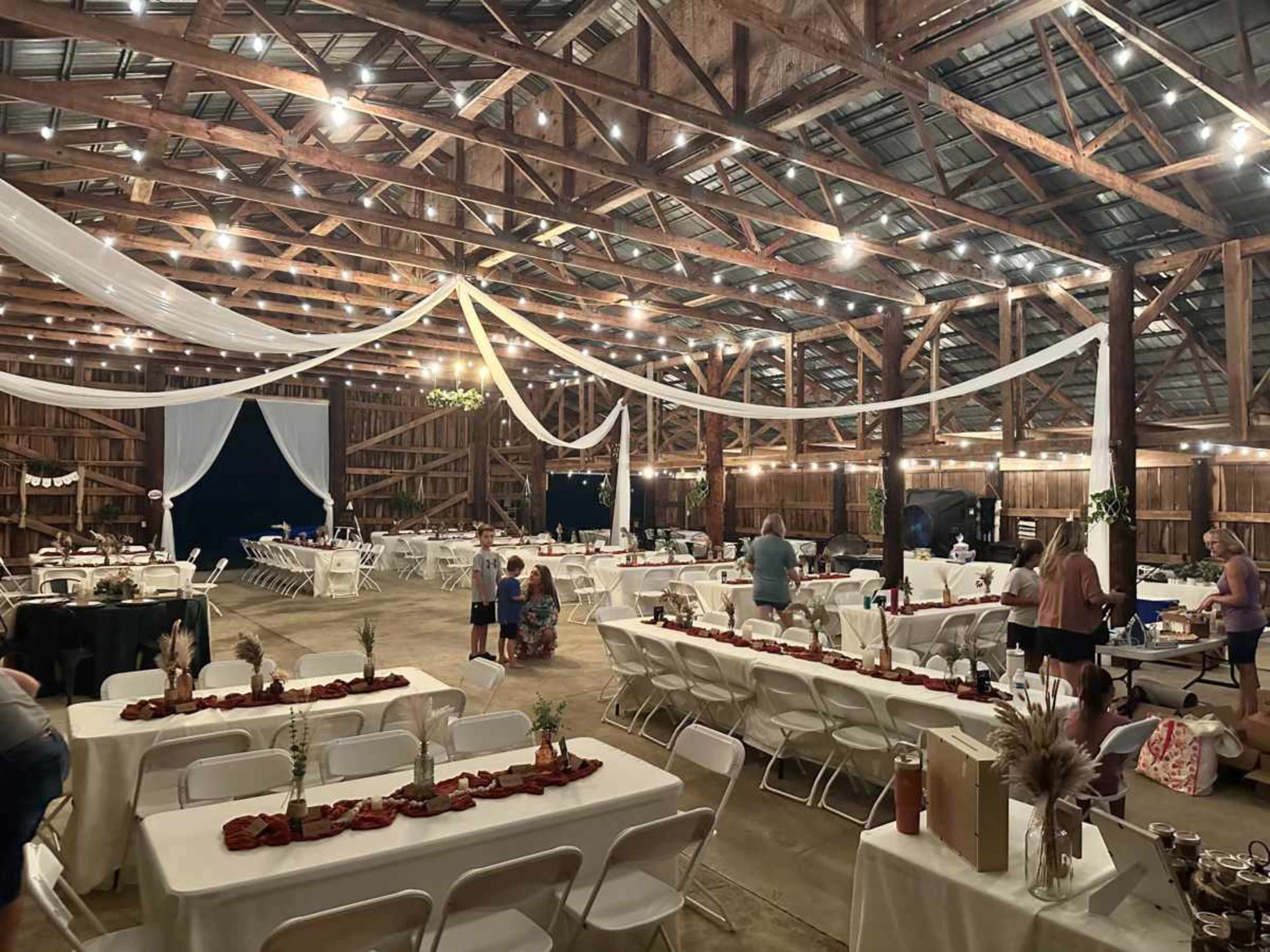 Rustic Barn Venue with Scenic Pond, String Lights, and Cozy On-Site Lodging Image in , Gallatin, TN