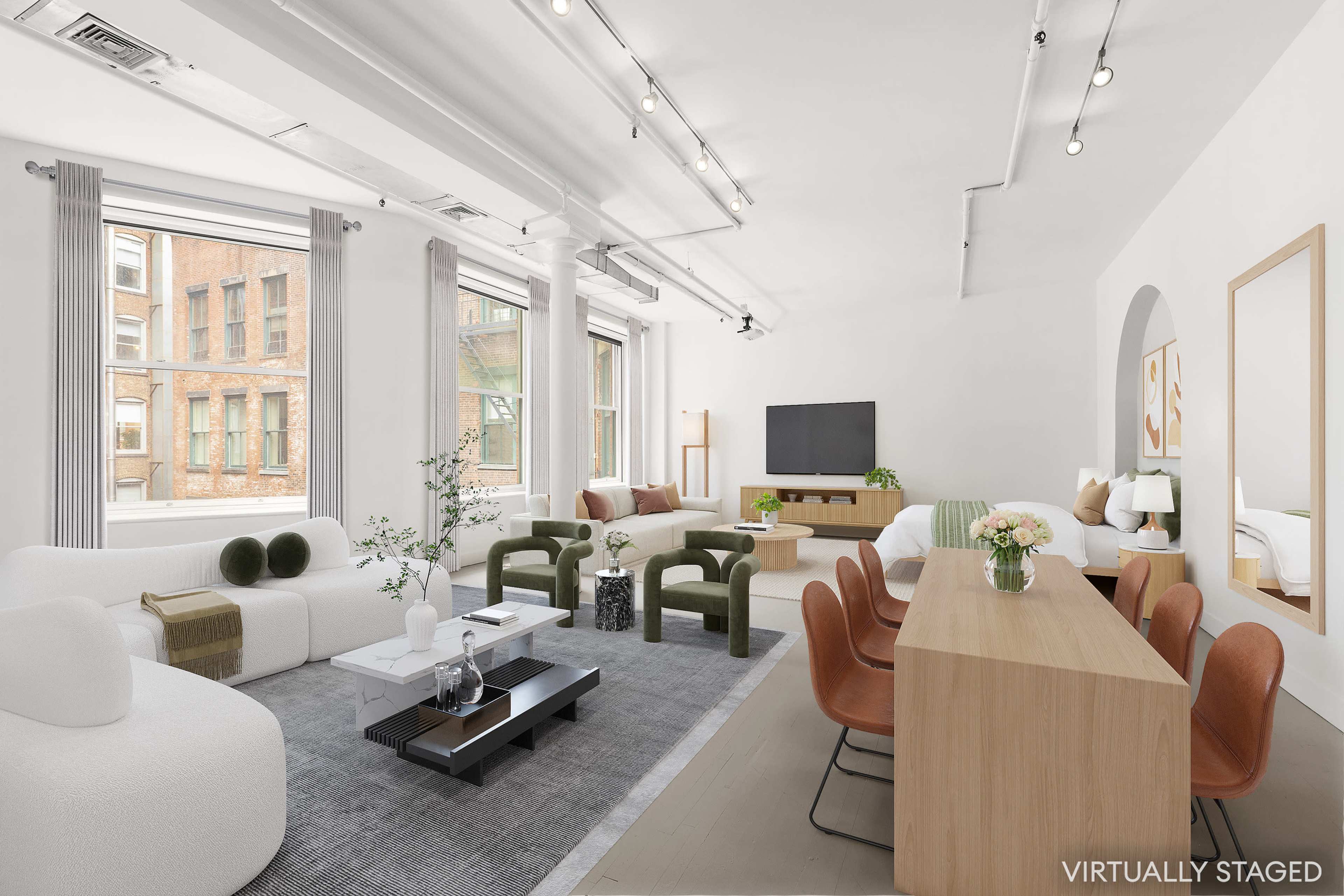 The image shows a bright, modern living room with a mix of seating areas, a dining table, and large windows overlooking a cityscape.