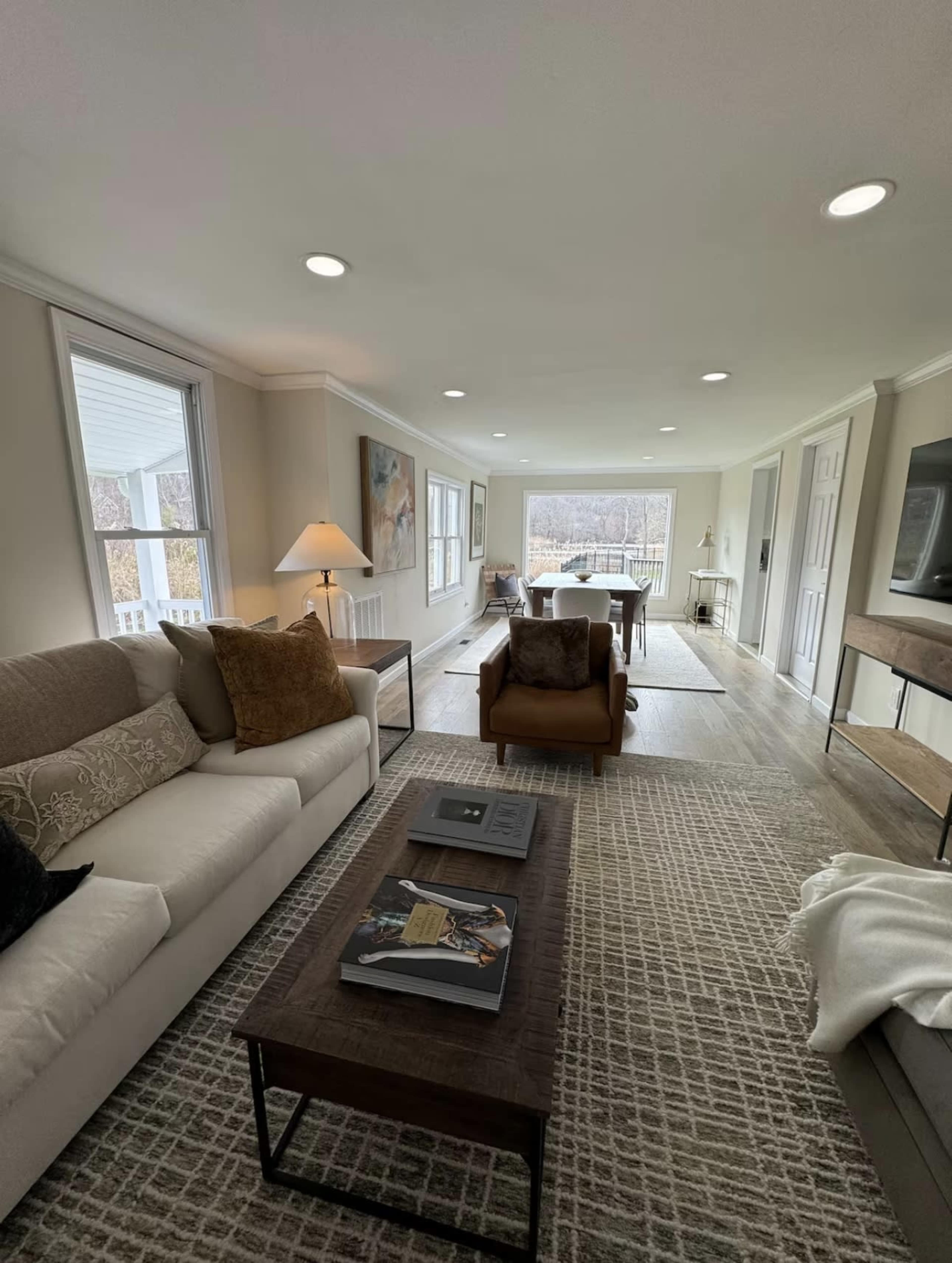 Modern farmhouse with a water view and pool on half an acre property Image in Riverhead, Wading River, NY