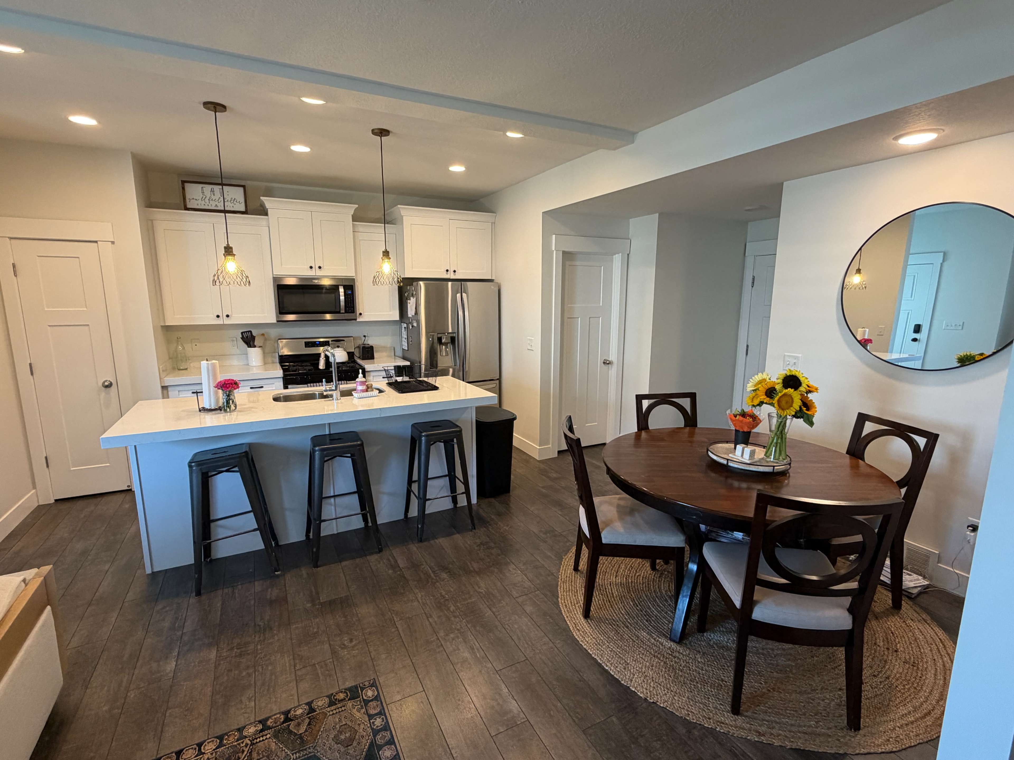Modern Versatile Townhome with Brick Wall, Living Areas, and Content Creation Space Image in Sandy, Sandy, UT