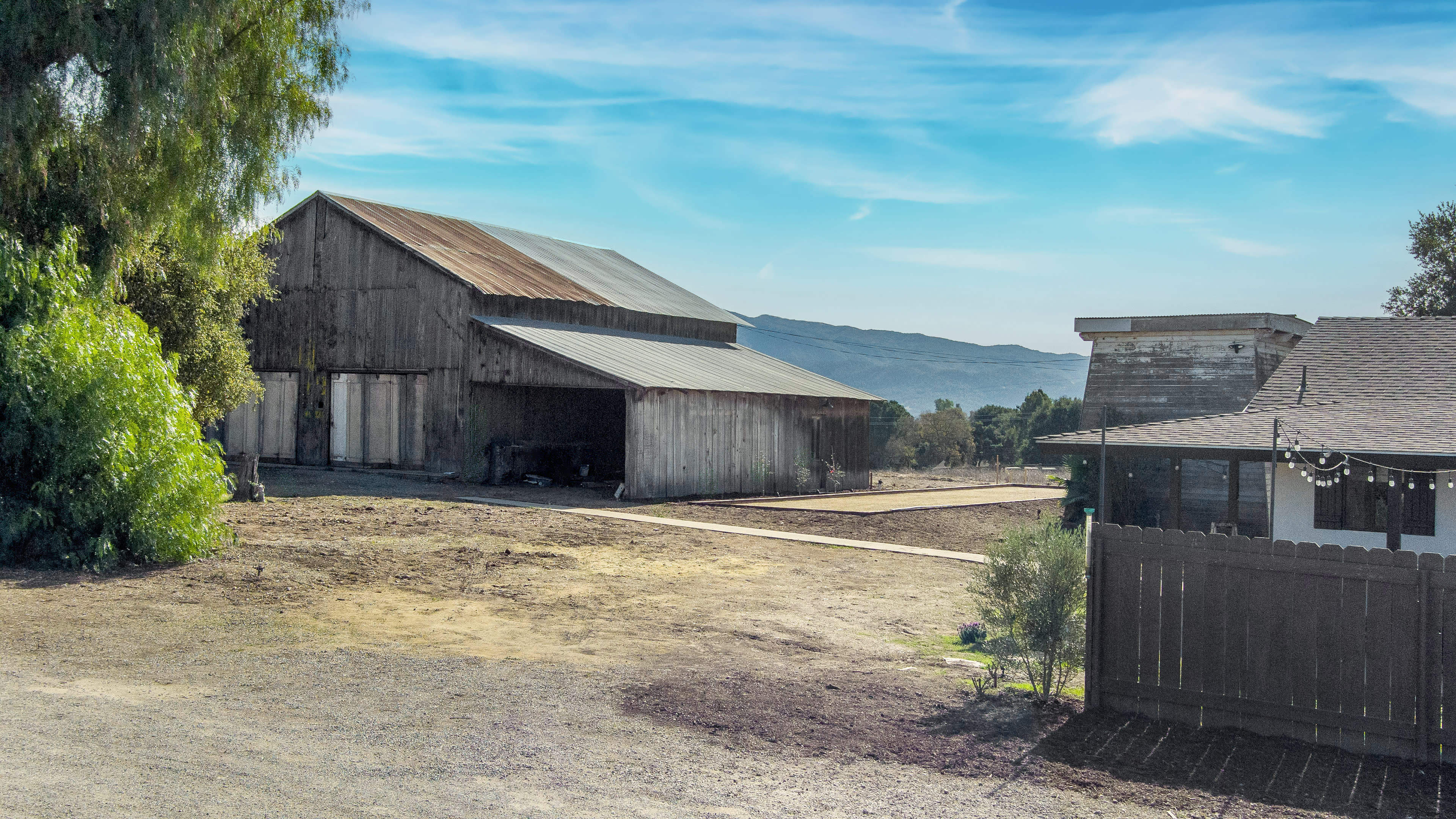 Beautiful Farmhouse with big beautiful outside area with barn. Image in Ballard, Santa Ynez, CA